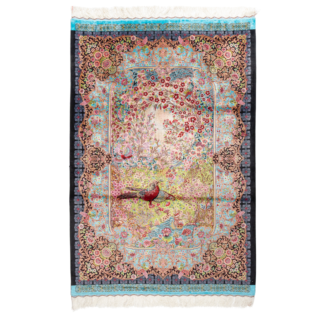 Elara Silk Rug featuring nature-inspired artwork with birds, flowers, and flowing water on an ivory base with turquoise and black borders, 150x100 cm.