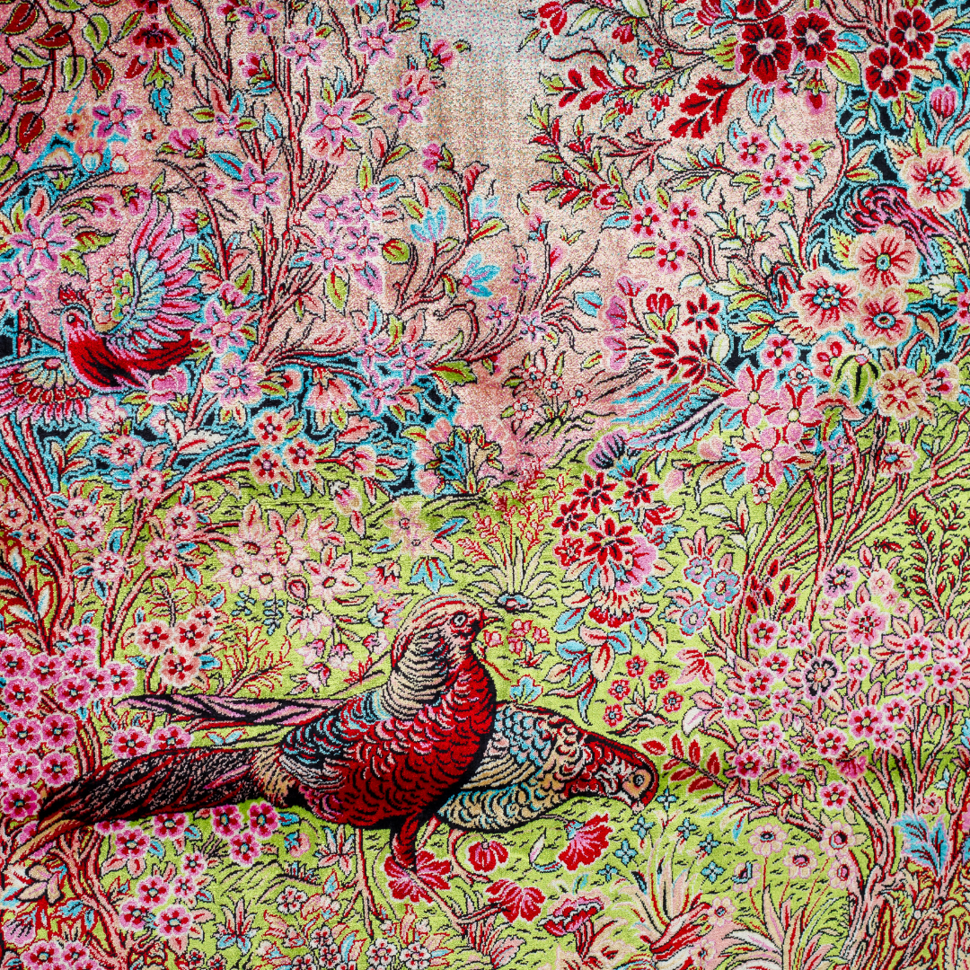 Elara Silk Rug featuring nature-inspired artwork with birds, flowers, and flowing water on an ivory base with turquoise and black borders, 150x100 cm.