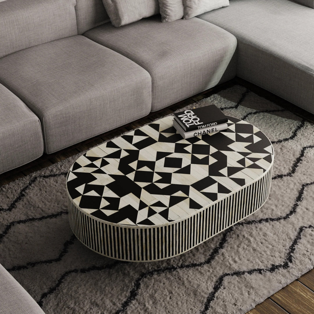 Black and white bone inlay coffee table with geometric pattern and gold base