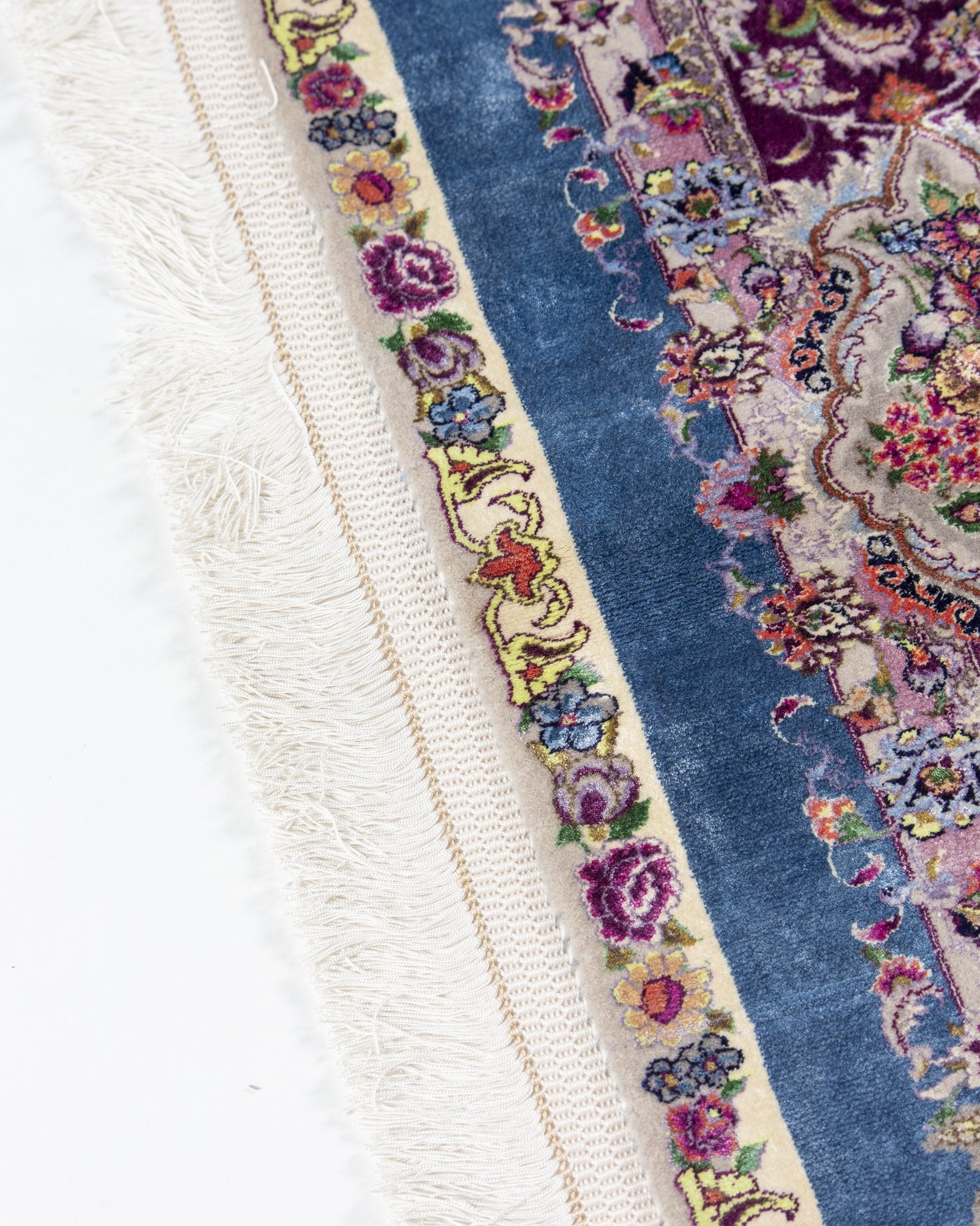 Farahnaz Persian silk and wool rug folded corner showing fine weave, powder blue 225 x 150 cm - Tabeer Homes Dubai