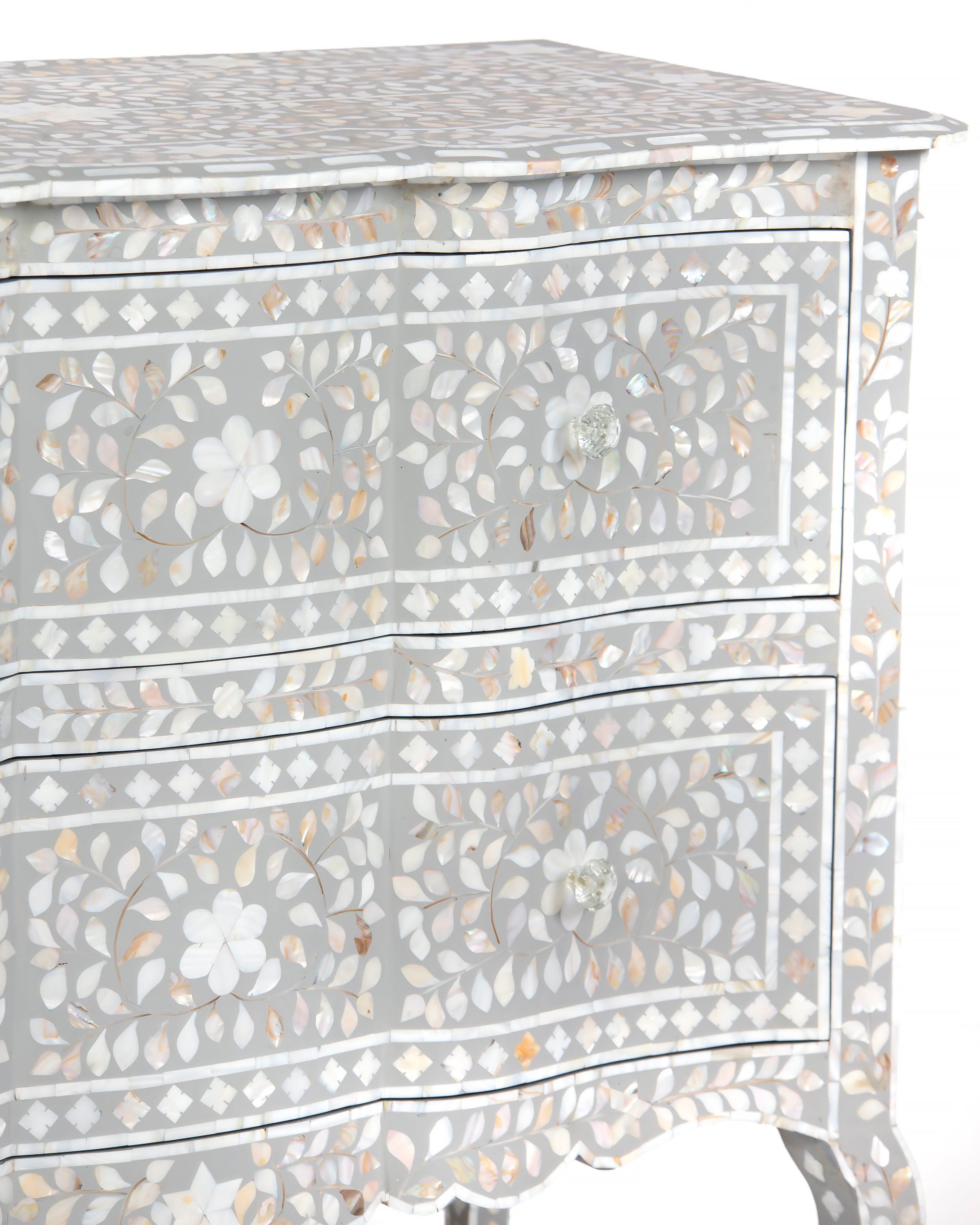 Two drawer fronts with mother of pearl floral inlay and crystal knobs