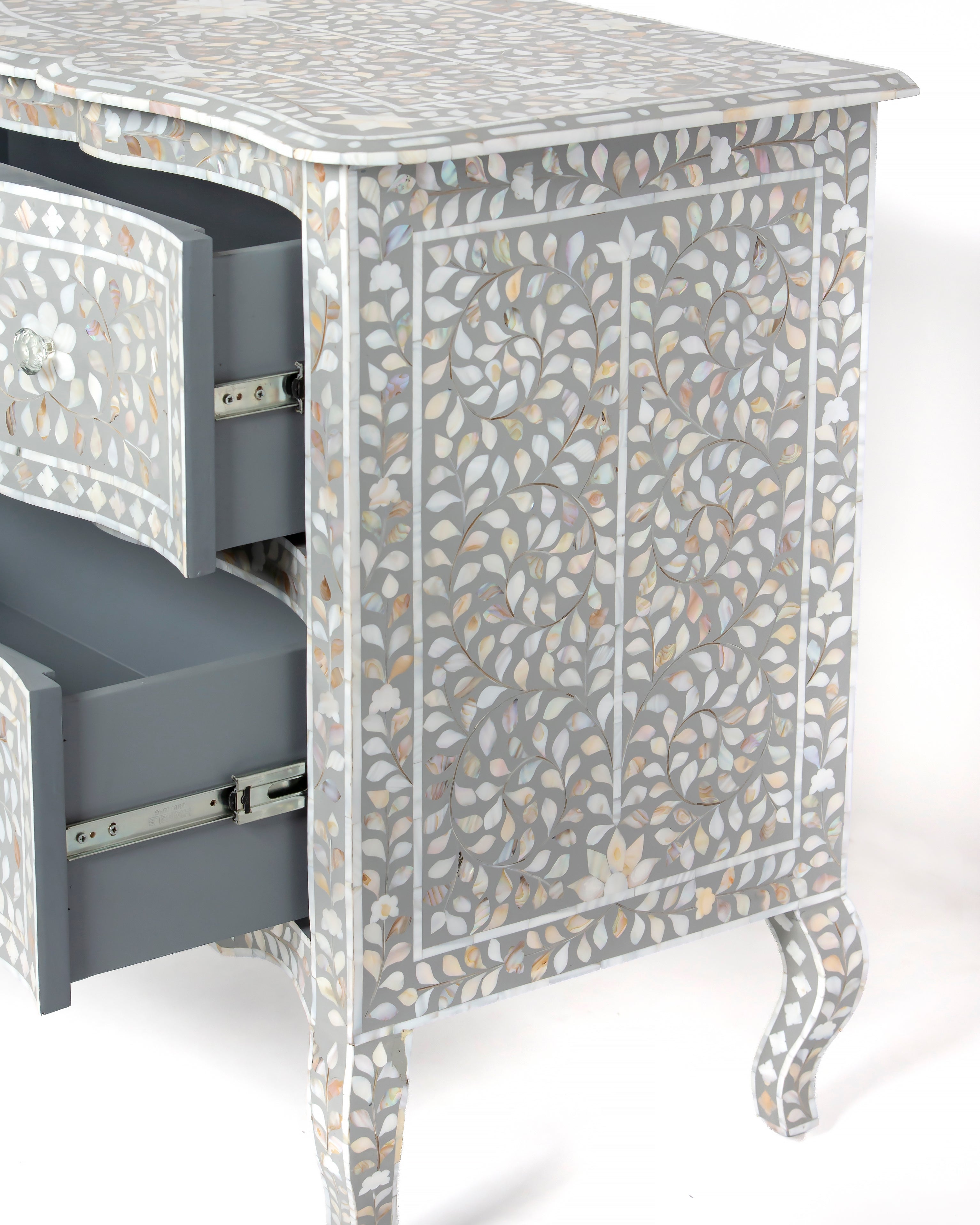 Mother of pearl inlay side panel of Iris grey chest of drawers