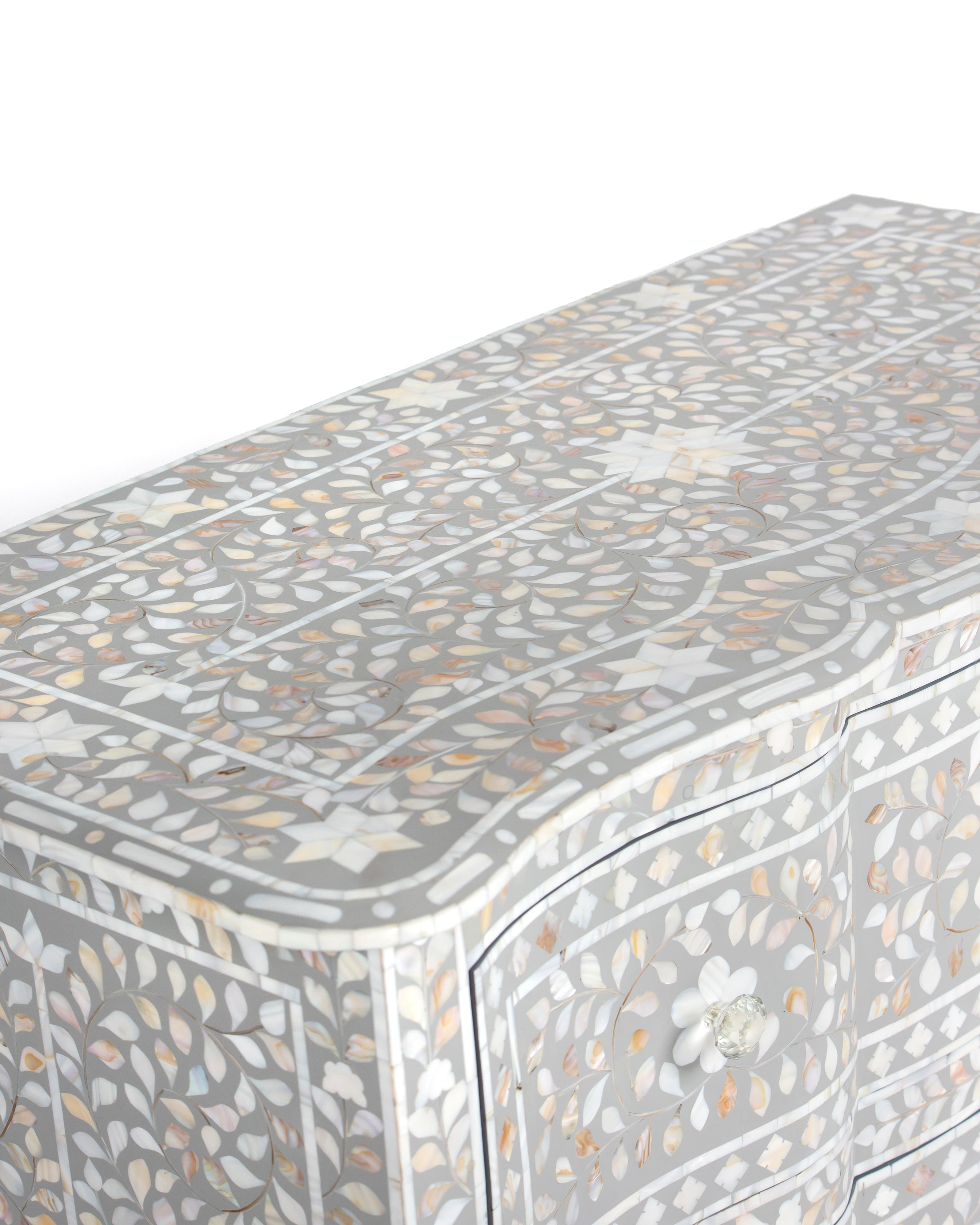 Handcrafted mother of pearl inlay top surface of Iris grey chest of drawers