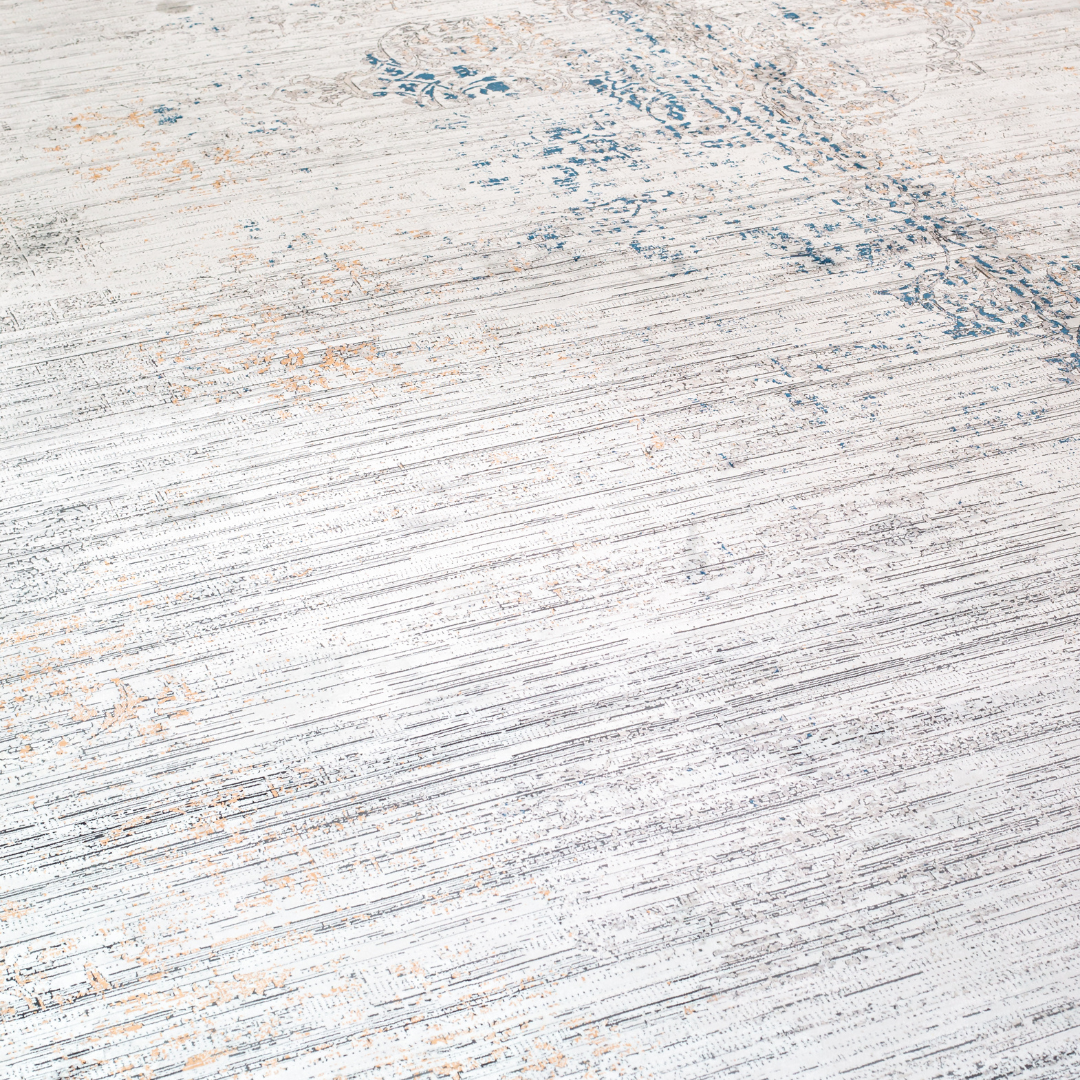 Kaelis Cotton rug in 400x300 cm featuring muted tones of grey, ivory, blue, and burnt orange in a softly distressed modern texture.