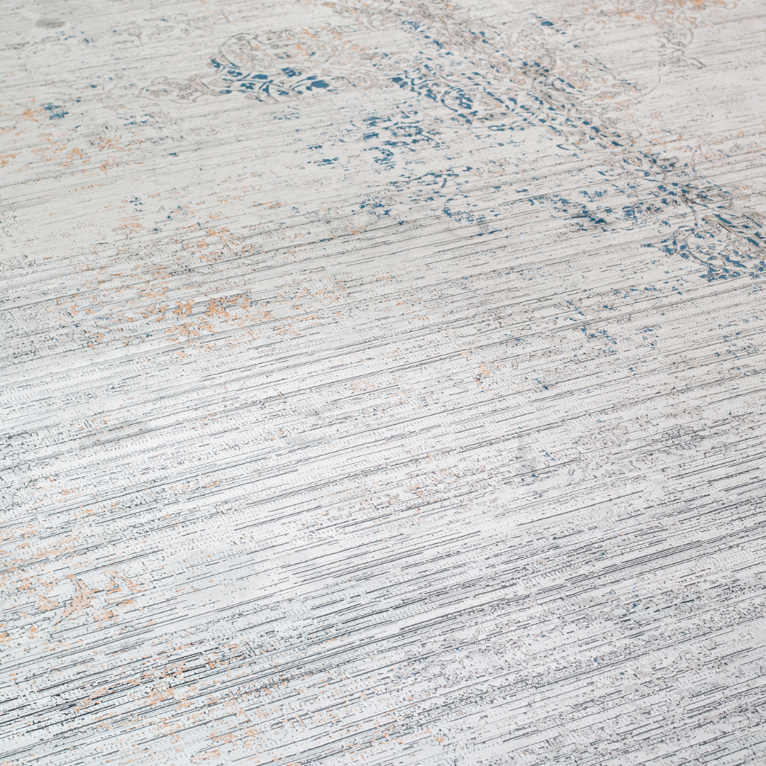 Kaelis Cotton rug in 400x300 cm featuring muted tones of grey, ivory, blue, and burnt orange in a softly distressed modern texture.