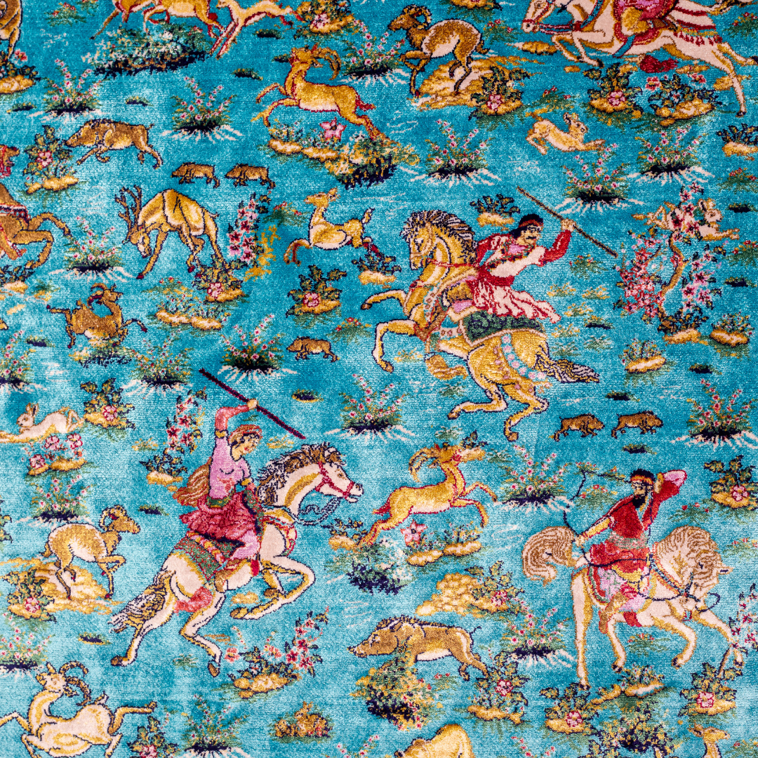 Exquisite silk rug in turquoise blue with detailed horsemen, floral borders, and intricate golden animal motifs, measuring 150x100 cms.