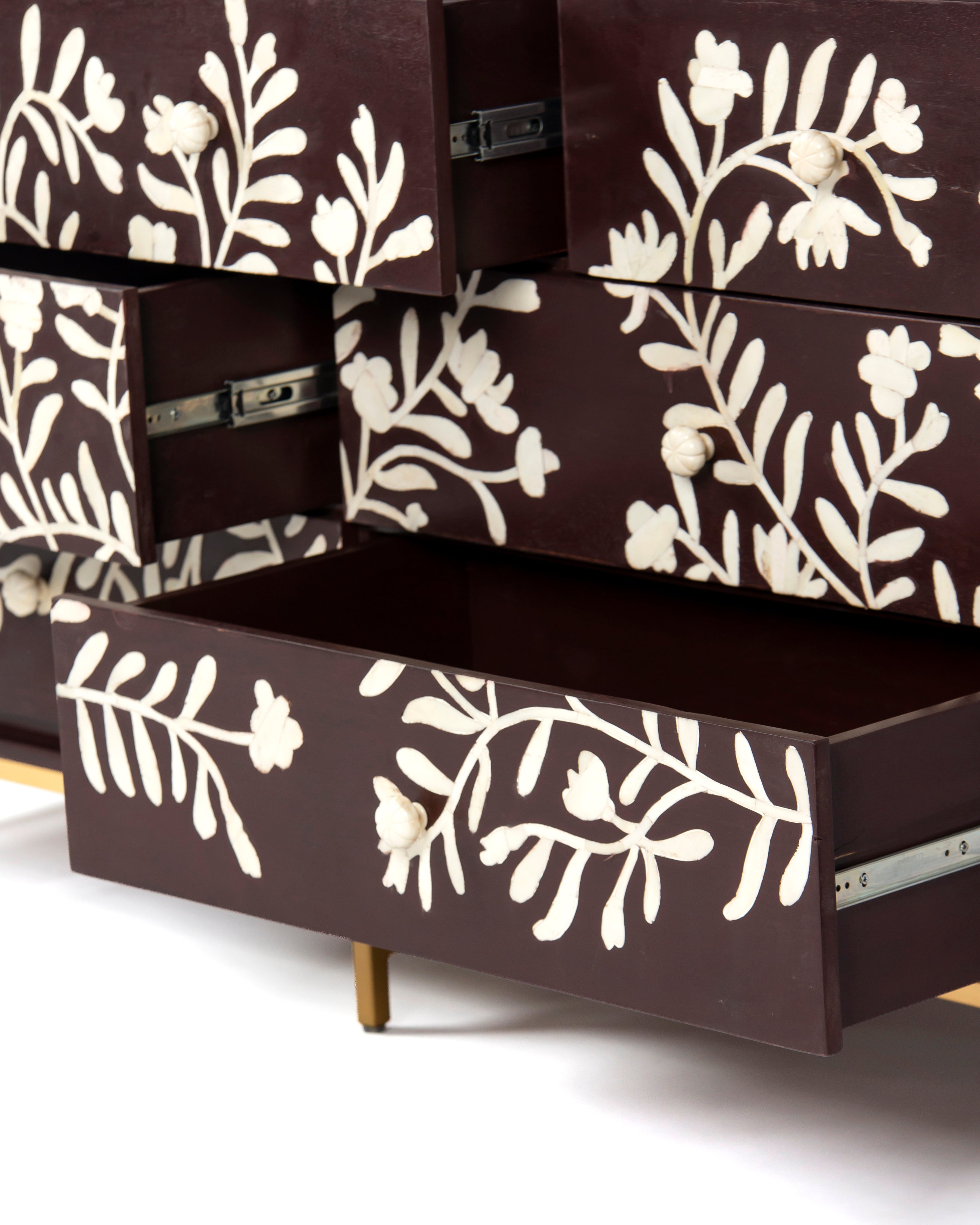 Open drawer interiors of Luna burgundy bone inlay dresser