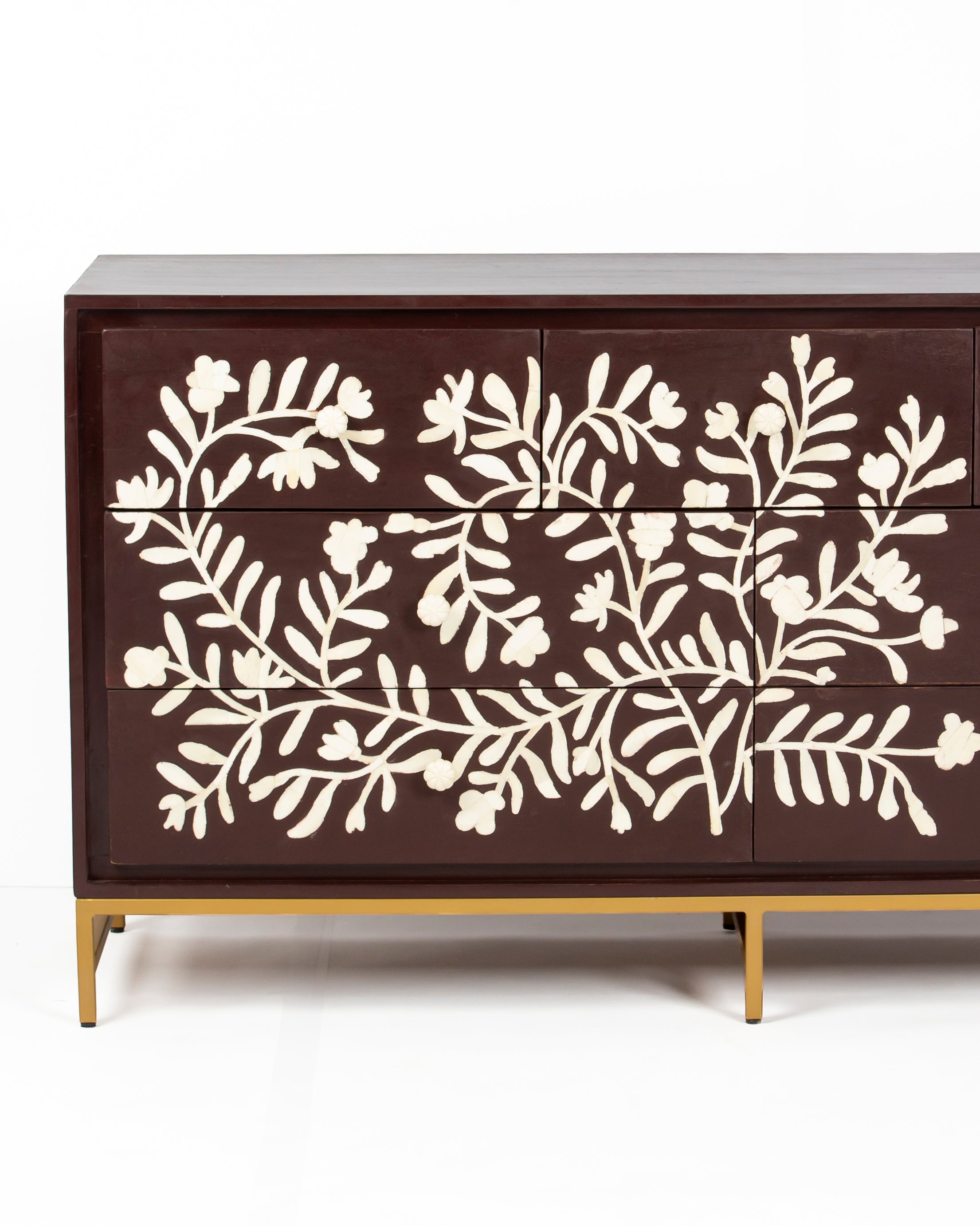 Front detail of floral bone inlay on Luna burgundy dresser
