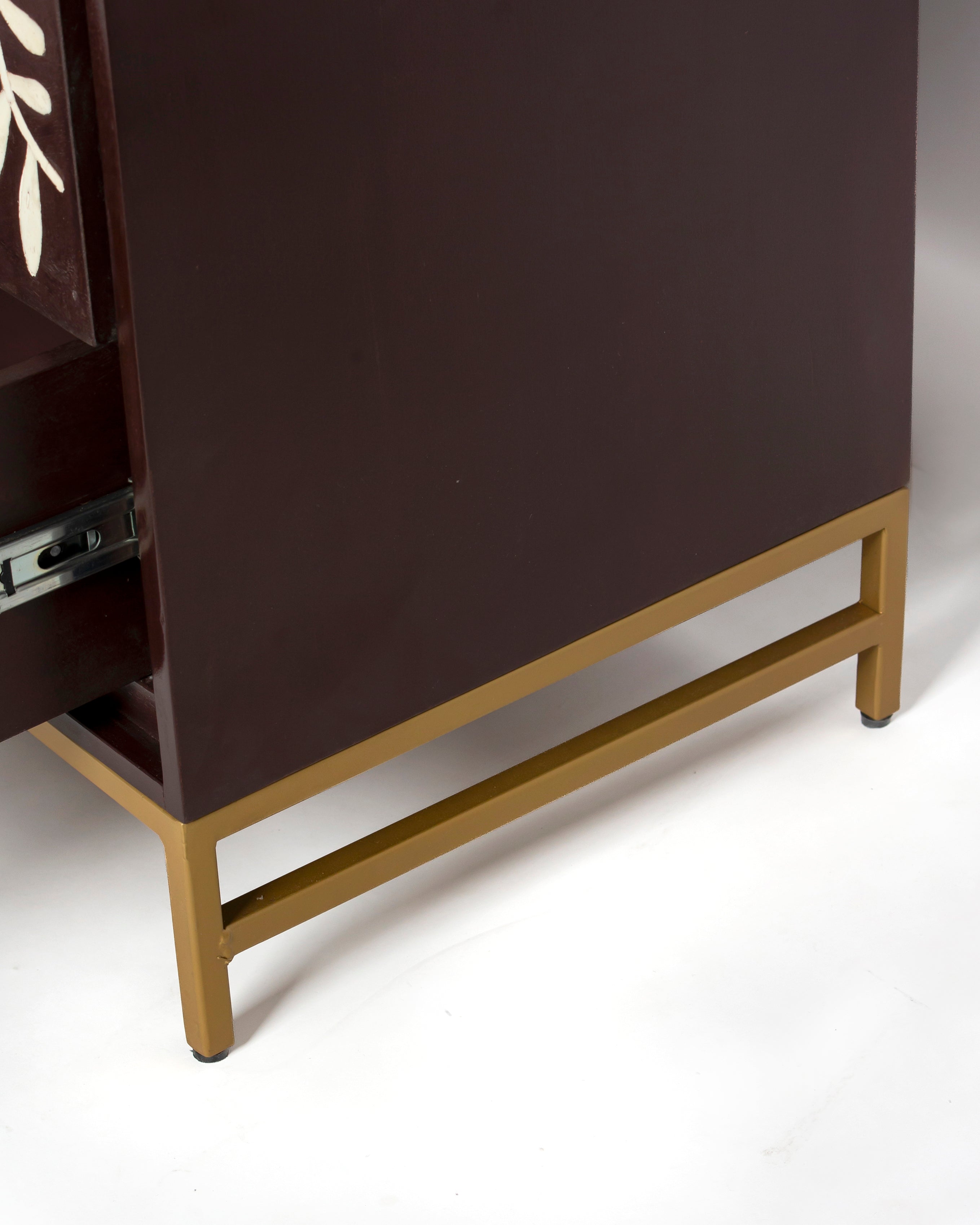 Gold metal legs and base frame of Luna burgundy dresser