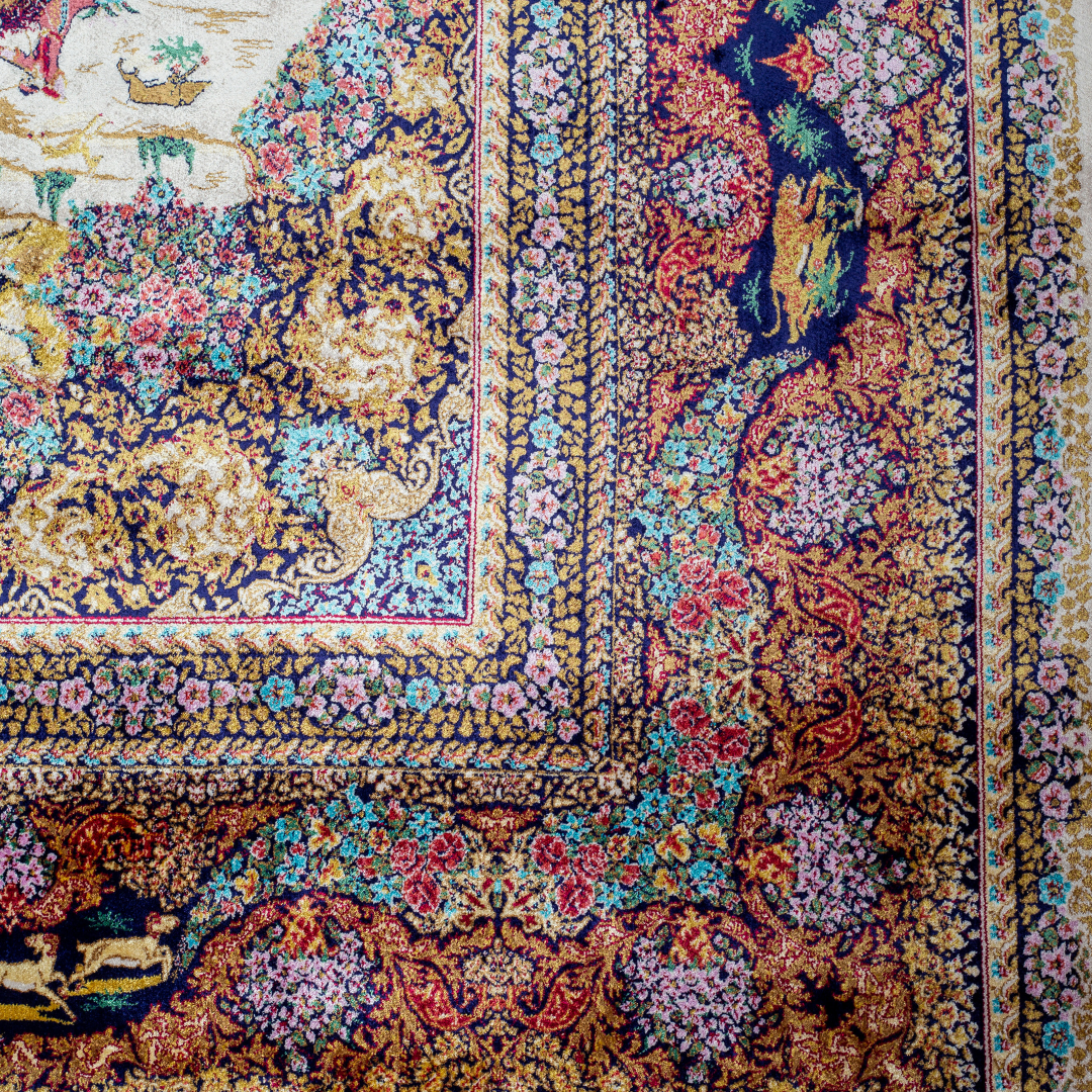 Luxurious silk rug with warriers and horses detailing and ornate floral border in rich tones. Intricate details handwoven for timeless appeal.