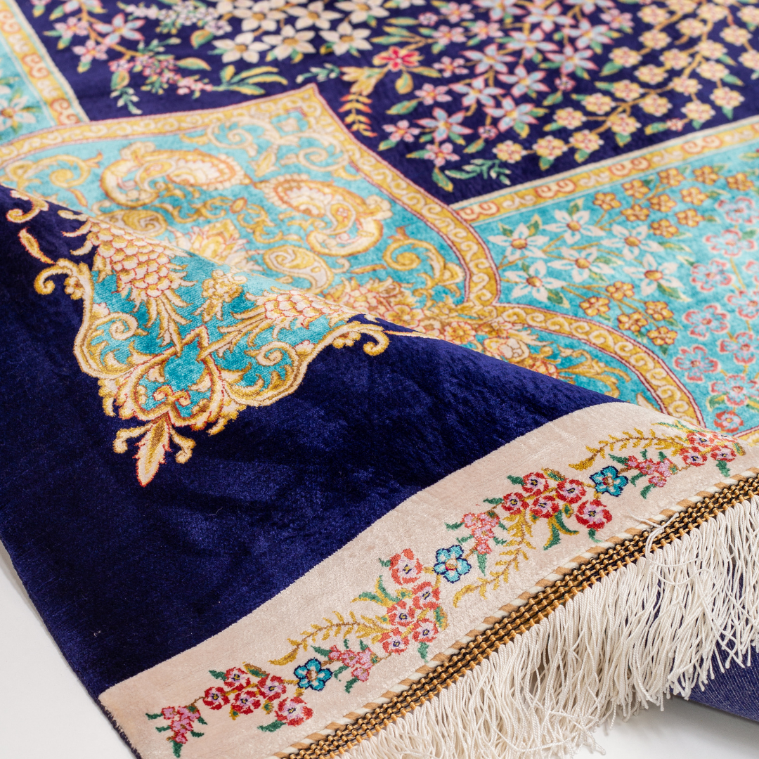 200x300 silk rug with multicolored bird and floral motifs, gold-turquoise borders, and detailed woven craftsmanship.