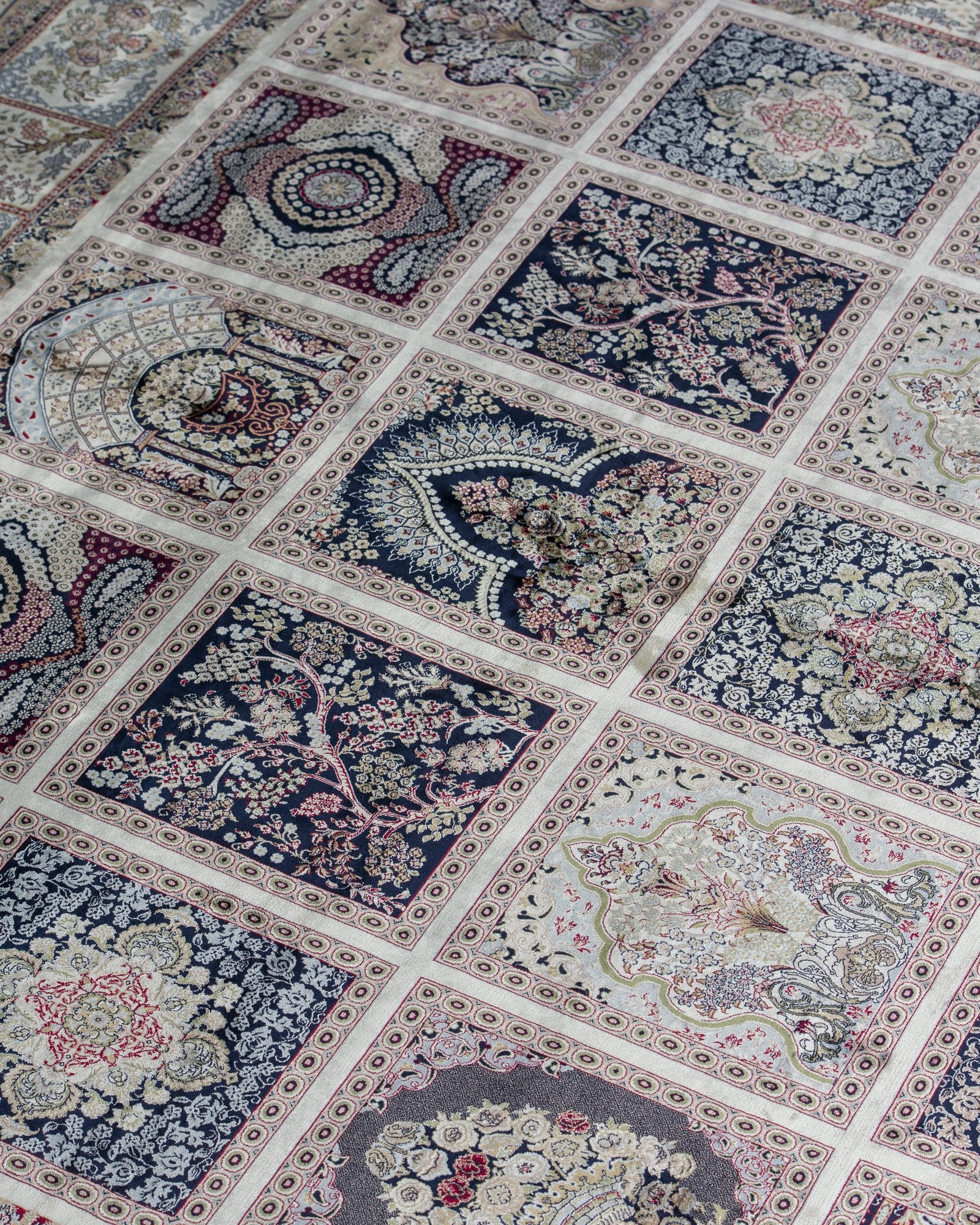 Pariwash silk carpet angled view showing ivory and grey tones, 250 x 350 cm - Tabeer Homes Dubai