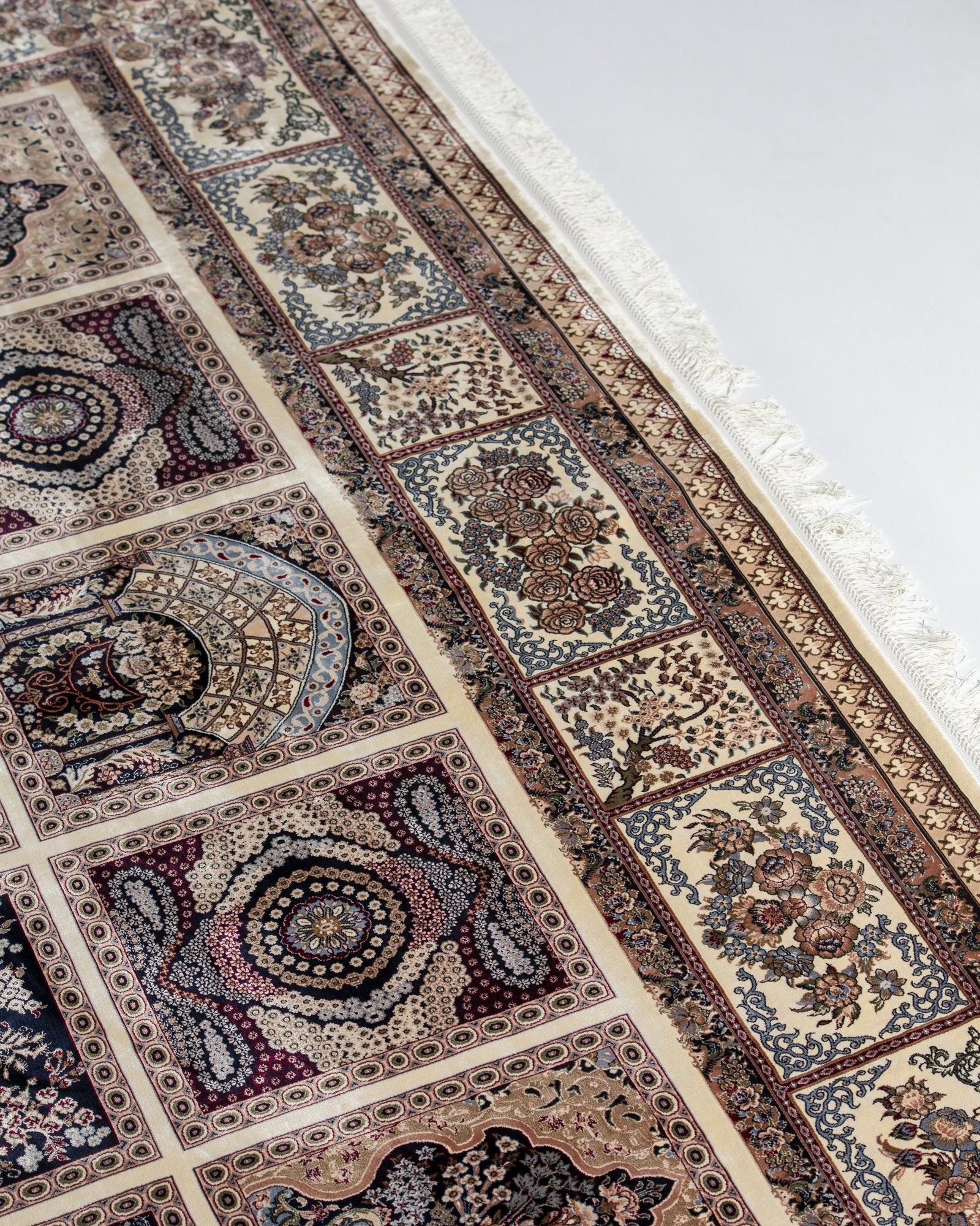 Pariwash Persian silk rug folded corner showing fine weave, ivory and grey 250 x 350 cm - Tabeer Homes Dubai