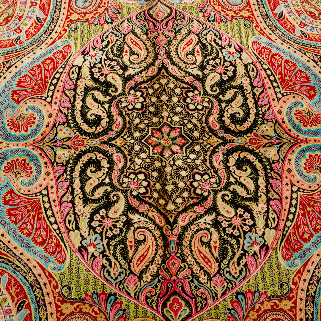 Ravana Silk Rug in 200x300 cms featuring intricate multicolour motifs with a bold medallion, paisleys, and vibrant borders.