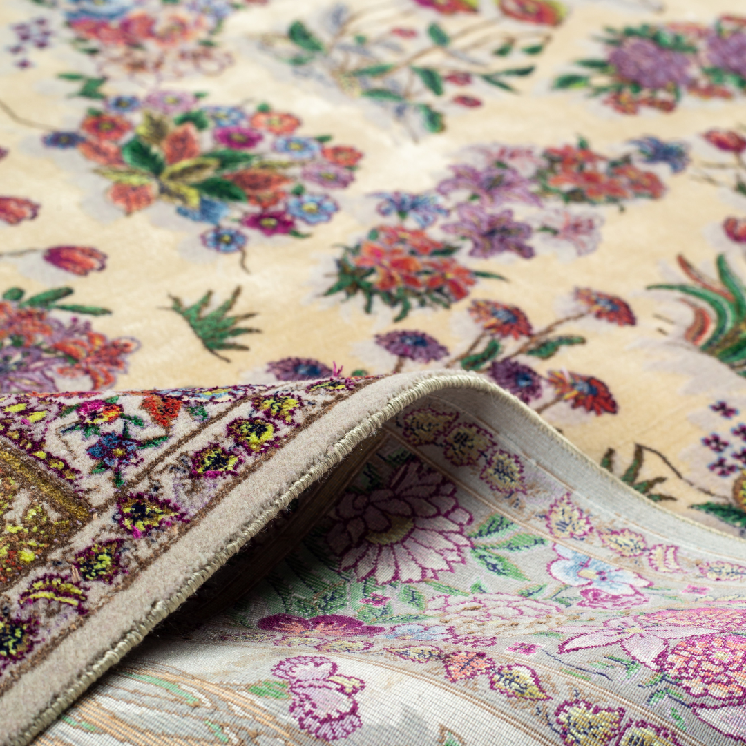 Floral silk rug in beige with multicolor detailing, handmade with intricate weaving and vibrant botanical patterns.