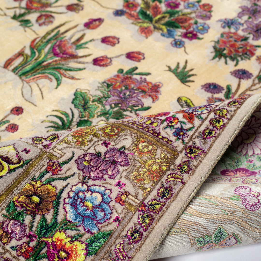 Floral silk rug in beige with multicolor detailing, handmade with intricate weaving and vibrant botanical patterns.