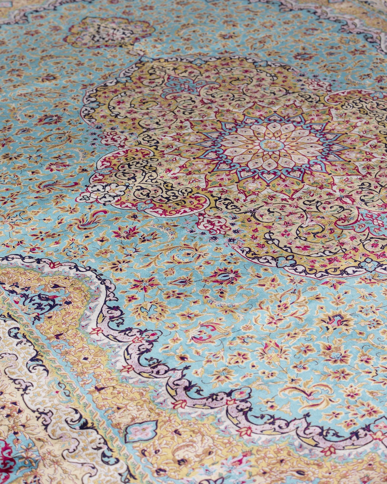 Sepideh silk carpet floral motif close-up in celadon blue, 250 x 350 cm - Tabeer Homes Dubai
