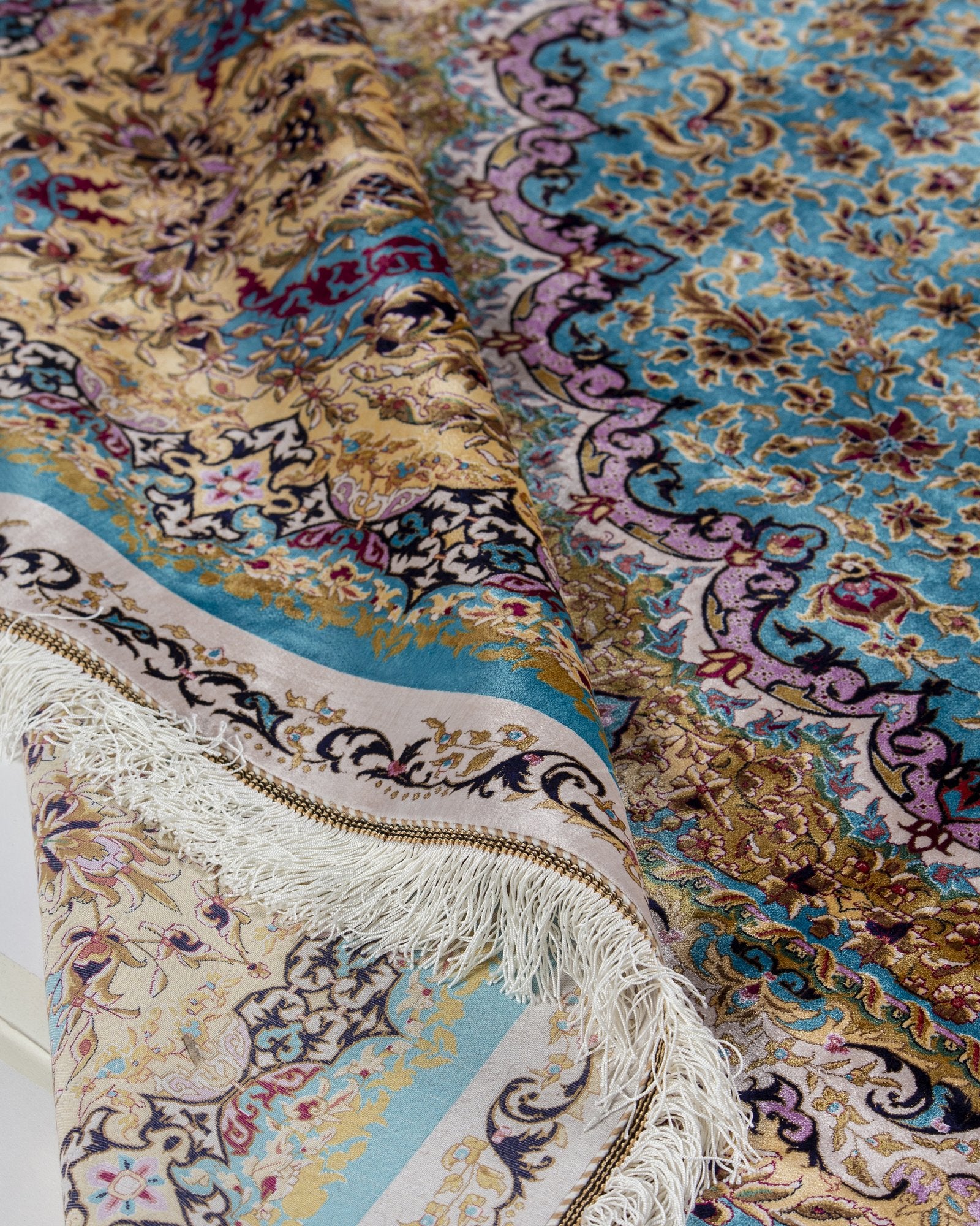 Sepideh silk carpet draped fold showing silk lustre, celadon blue 250 x 350 cm - Tabeer Homes Dubai