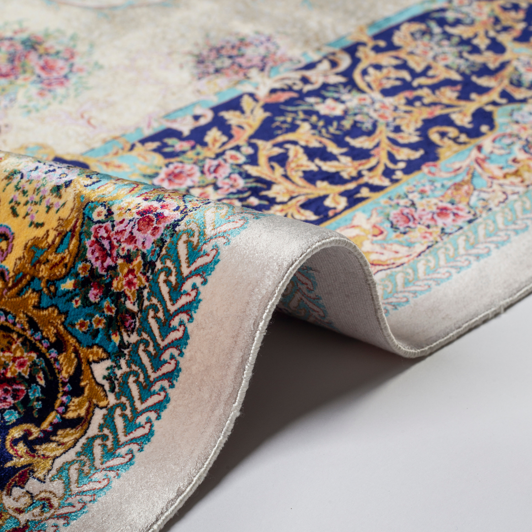 Close-up of the Seraphine silk rug showing intricate floral patterns, soft sheen and detailed design.