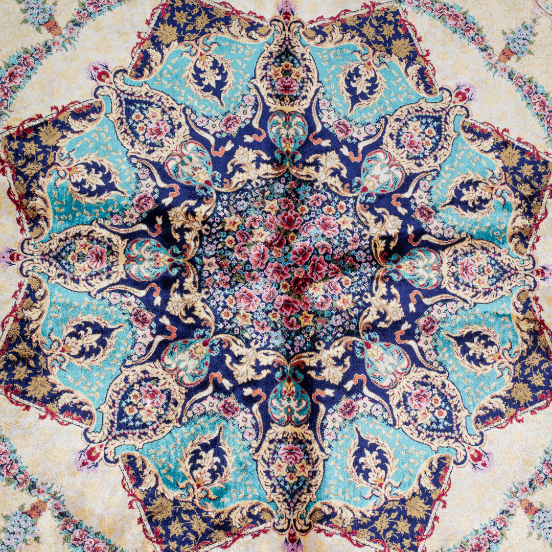Close-up of the Seraphine silk rug showing intricate floral patterns, soft sheen and detailed design.