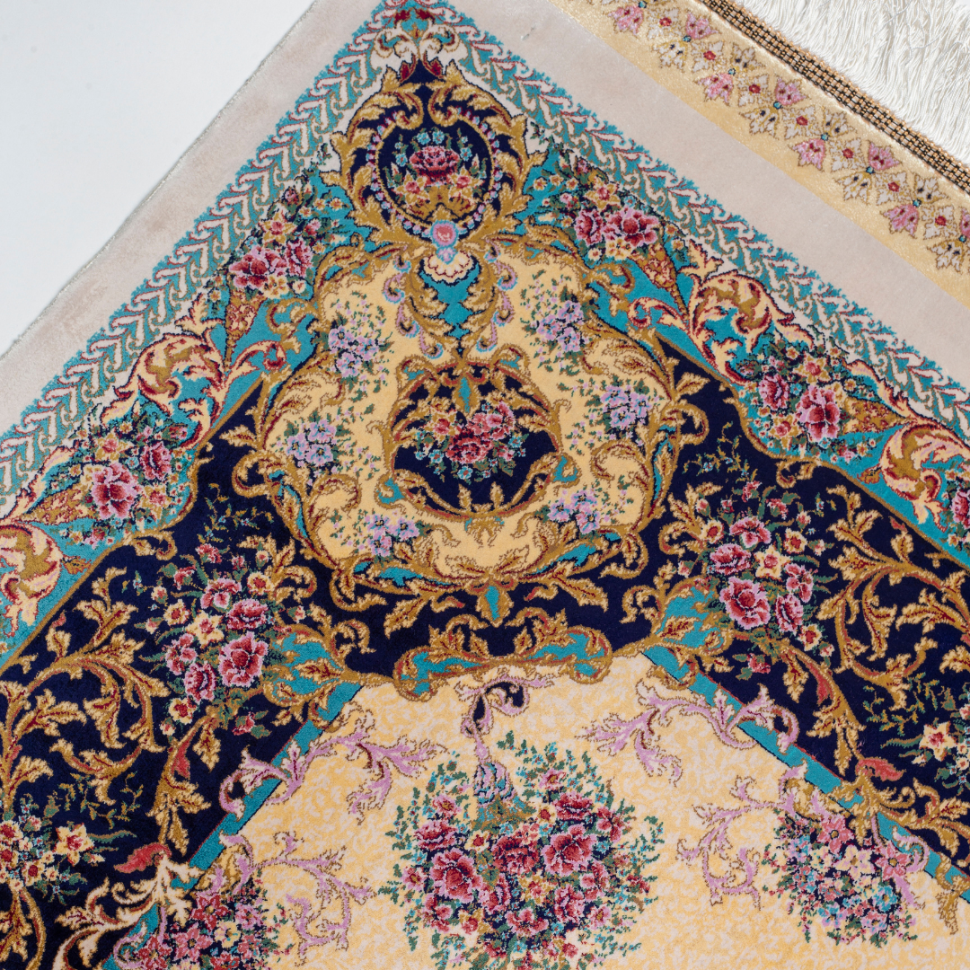 Close-up of the Seraphine silk rug showing intricate floral patterns, soft sheen and detailed design.