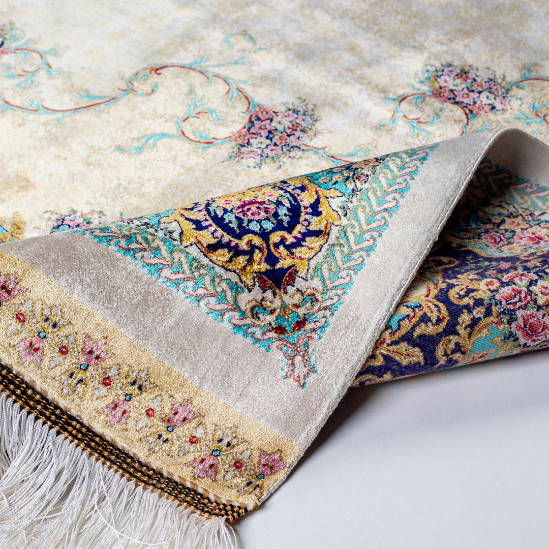 Close-up of the Seraphine silk rug showing intricate floral patterns, soft sheen and detailed design.
