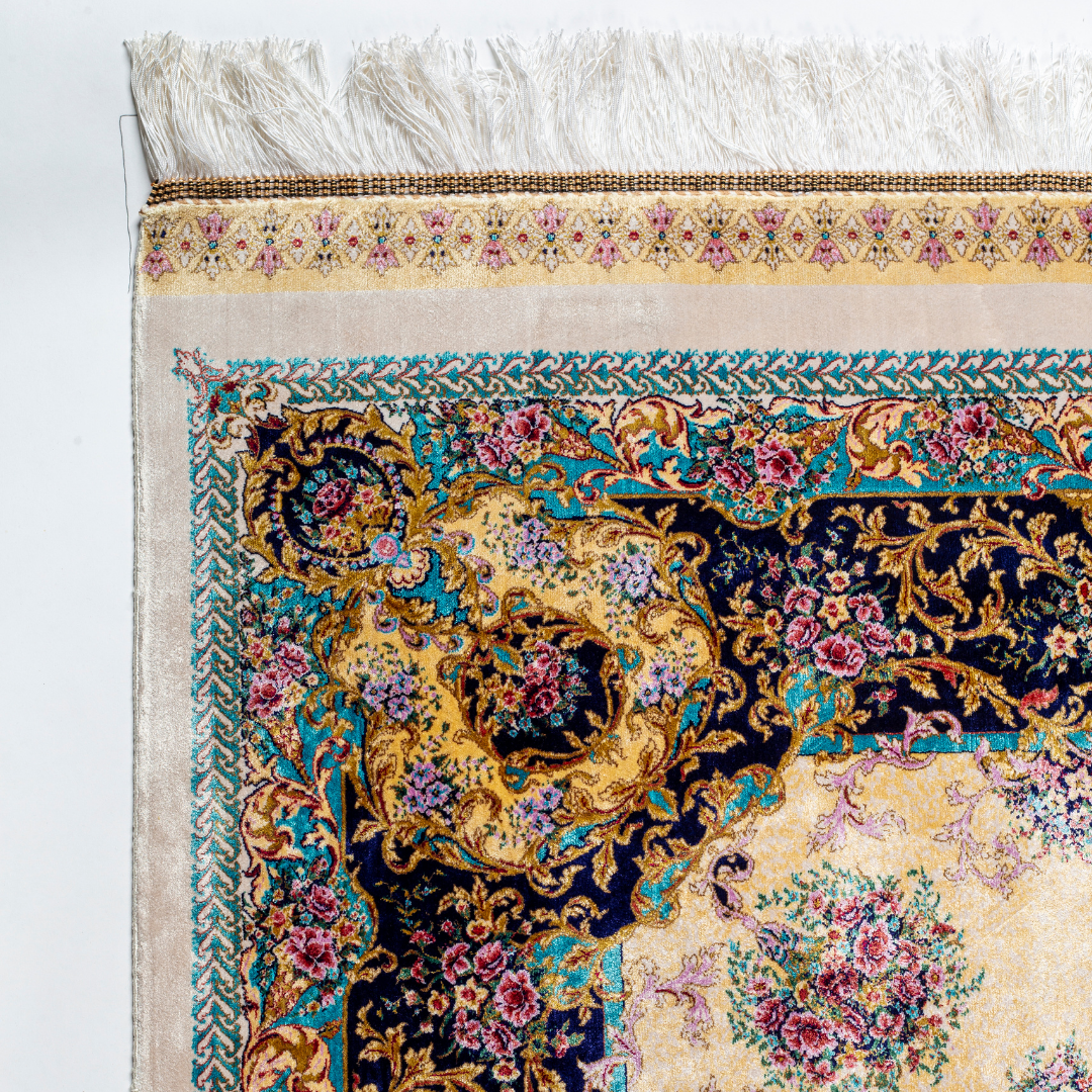 Close-up of the Seraphine silk rug showing intricate floral patterns, soft sheen and detailed design.