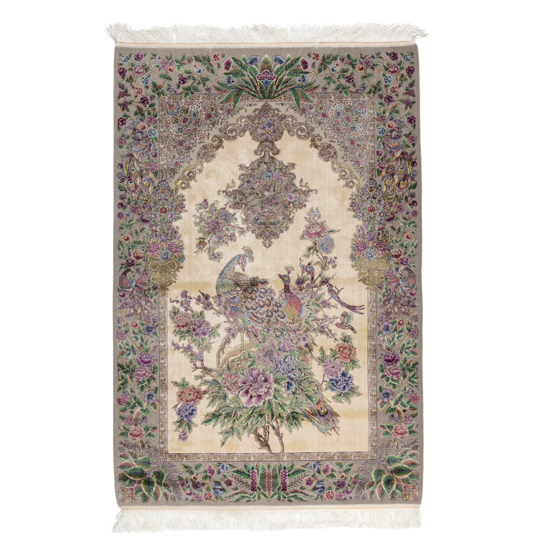 Luxurious ivory silk rug featuring peacocks, floral motifs, and intricate detailing, handcrafted with multicolored threads.