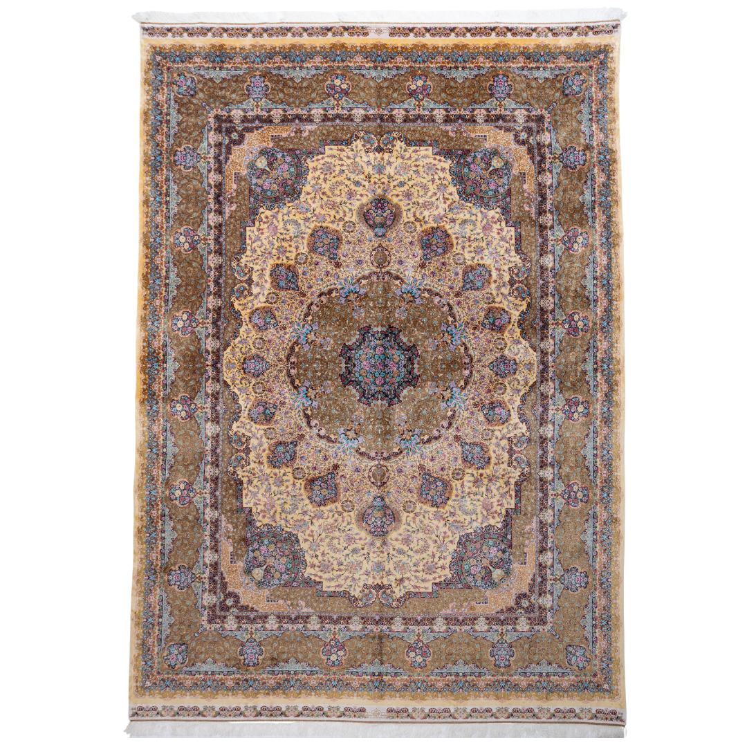 Luxurious silk rug featuring floral medallion pattern in gold, ivory, rose, and turquoise tones with intricate craftsmanship.