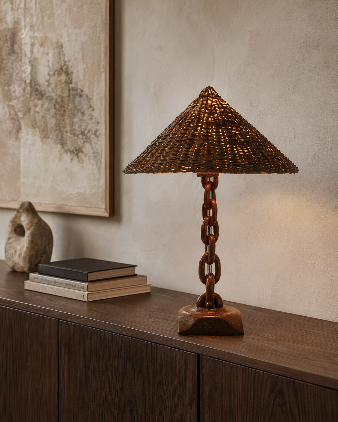 The Anchor Table Lamp by The Qratist features a handcrafted solid wood chain base with a woven wicker shade, creating a warm coastal inspired table lamp with natural ambient illumination.