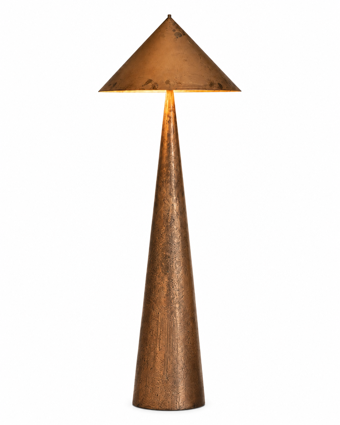 The Compass Floor Lamp by The Qratist features a handcrafted copper finished metal body with a sculptural geometric silhouette inspired by the timeless precision of a compass, creating a bold contemporary lighting statement.