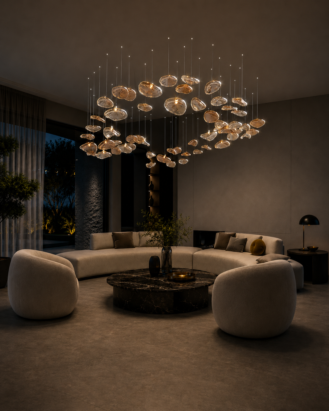 The Halo Chandelier by The Qratist features suspended rose gold glass elements arranged in a sculptural circular composition inspired by a radiant halo.