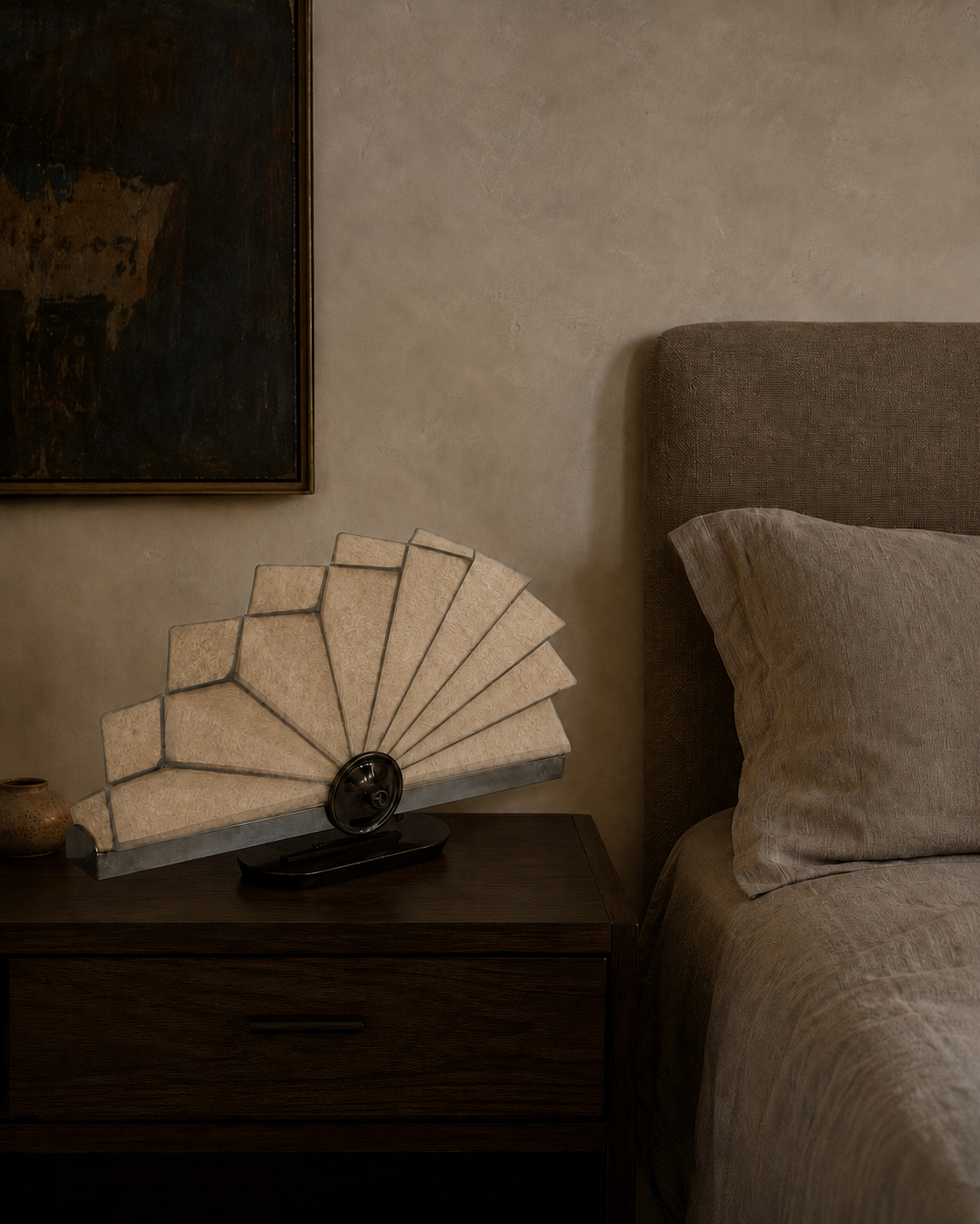 The Operatic Table Lamp by The Qratist features handcrafted paper panels arranged in an elegant fan inspired form with a refined metal frame, creating a sculptural table lamp with soft ambient illumination.