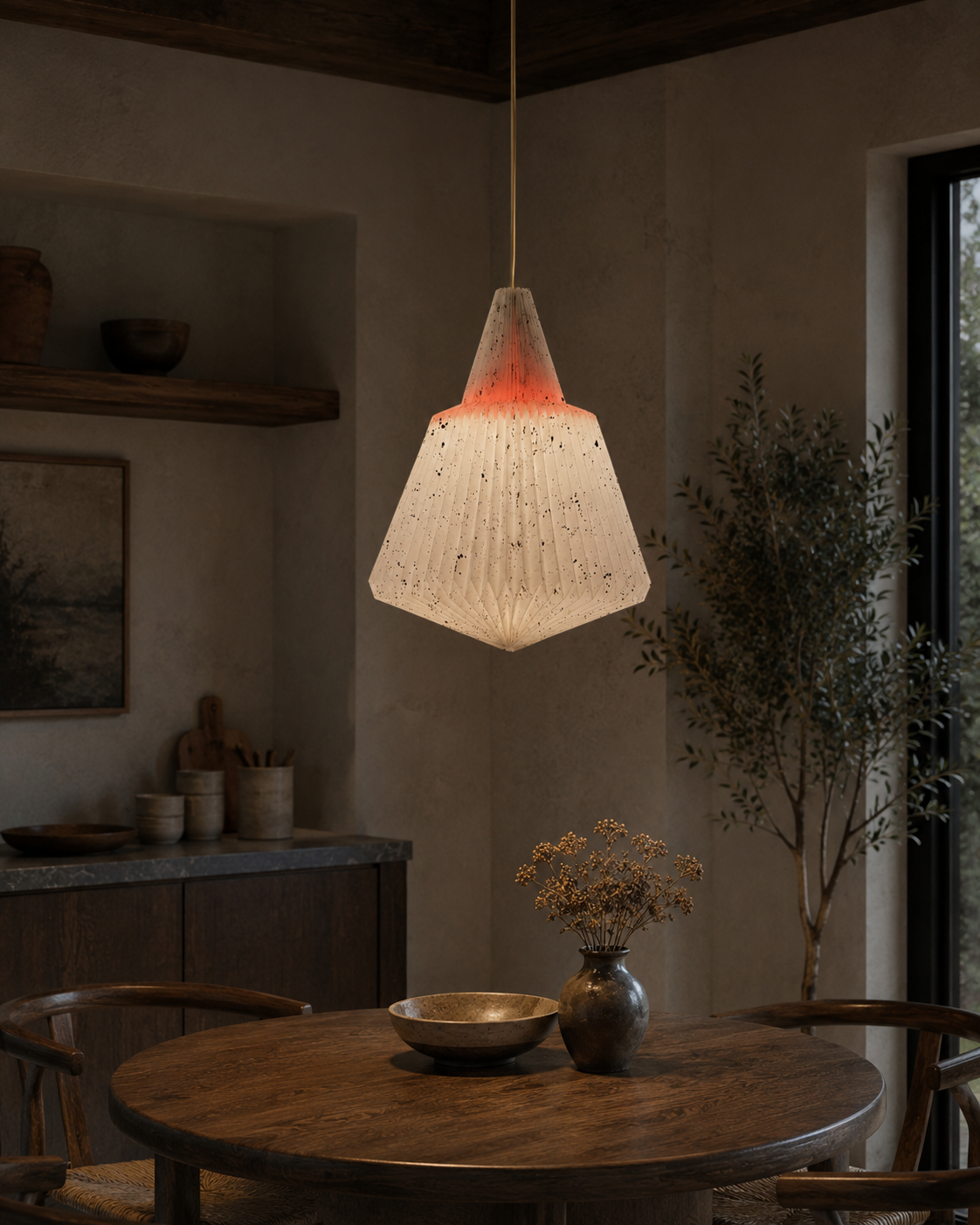 The Parchment Pendant Chandelier by The Qratist features a handcrafted pleated shade made from recycled synthetic and natural fibres, creating a warm sculptural statement with soft ambient lighting.