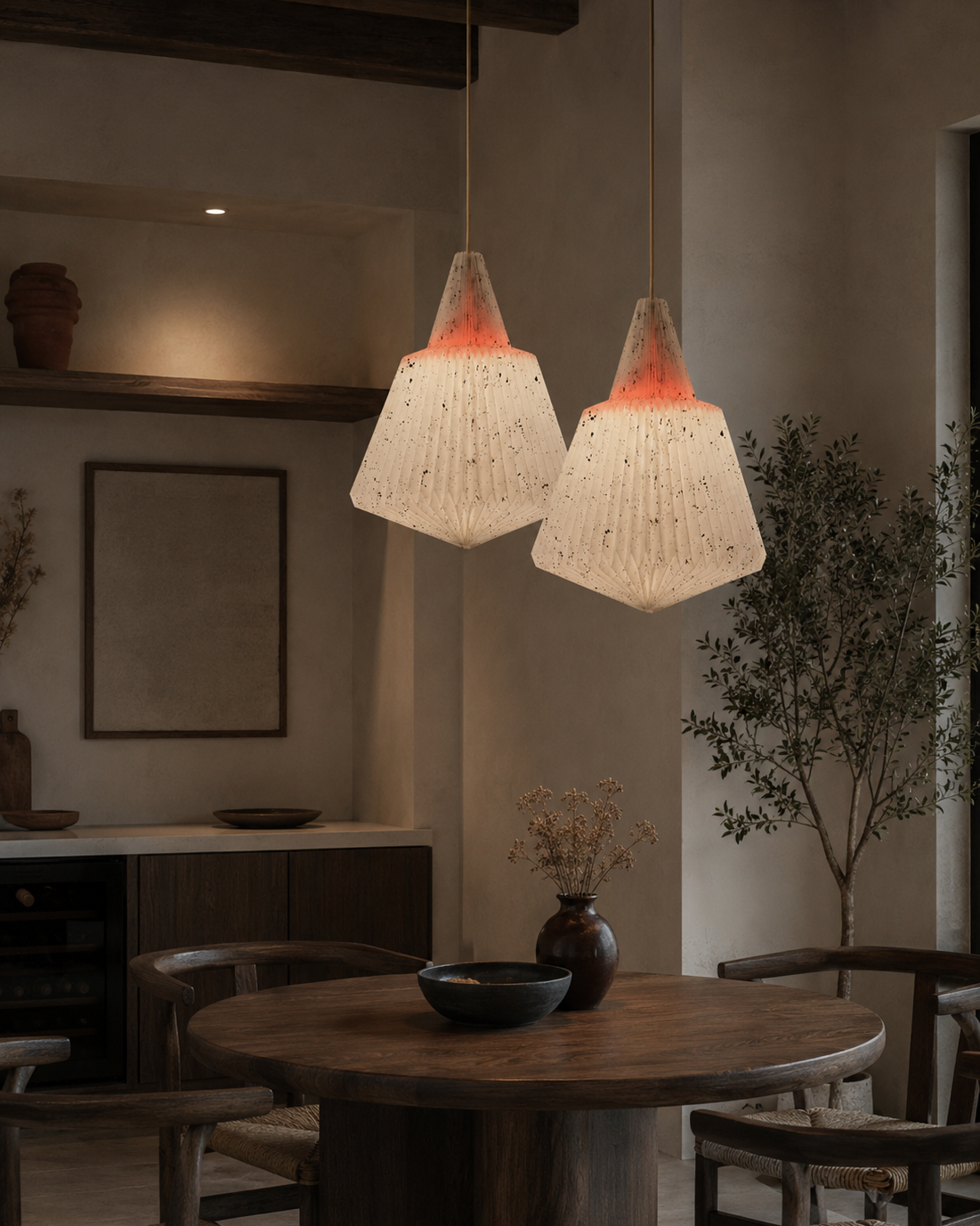 The Parchment Pendant Chandelier by The Qratist features a handcrafted pleated shade made from recycled synthetic and natural fibres, creating a warm sculptural statement with soft ambient lighting.