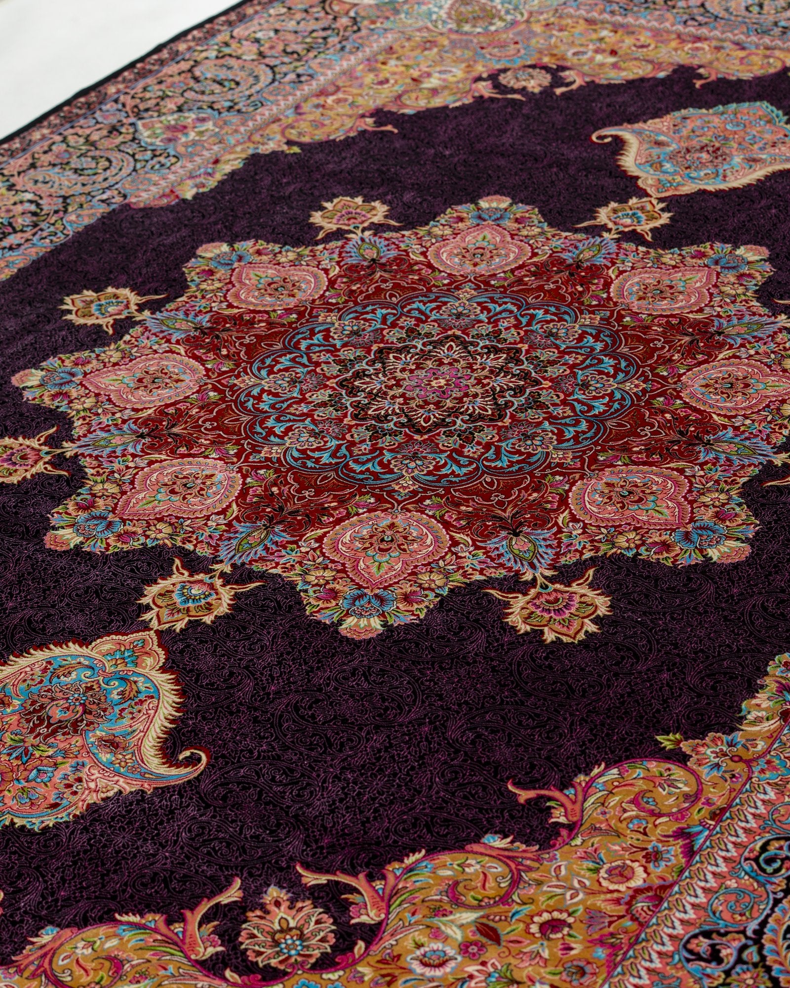 Valentina silk carpet angled view showing aubergine tones, 200 x 300 cm - Tabeer Homes Dubai