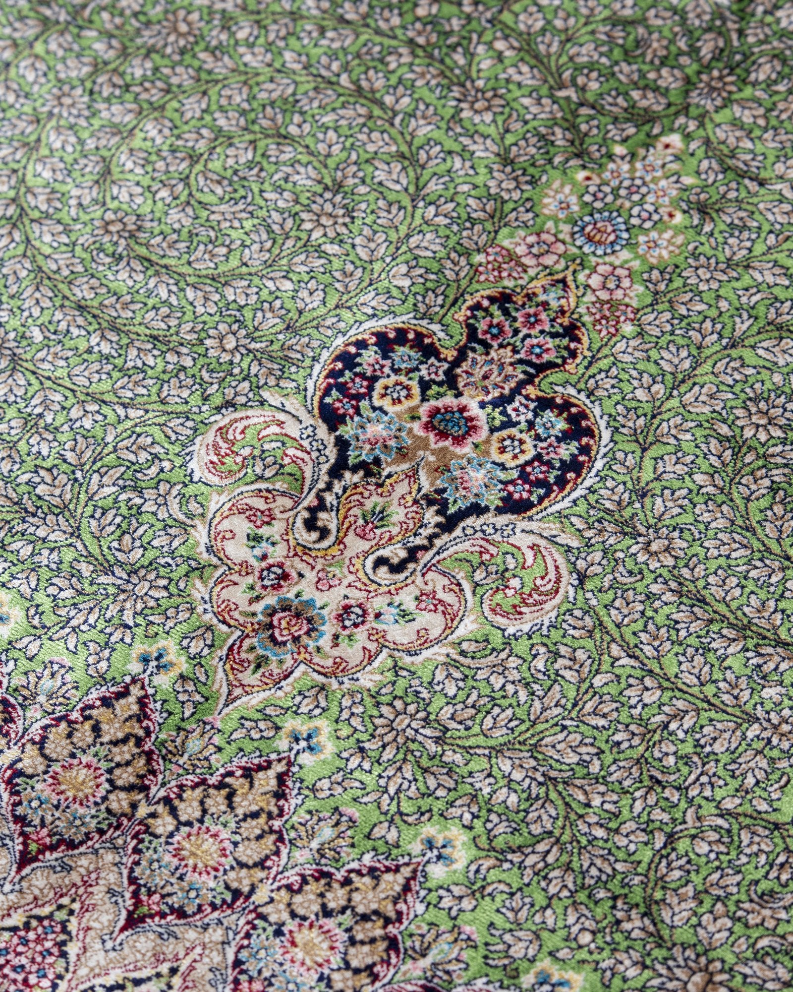 Verona Persian silk rug folded corner showing fine weave, sage green 200 x 300 cm - Tabeer Homes Dubai