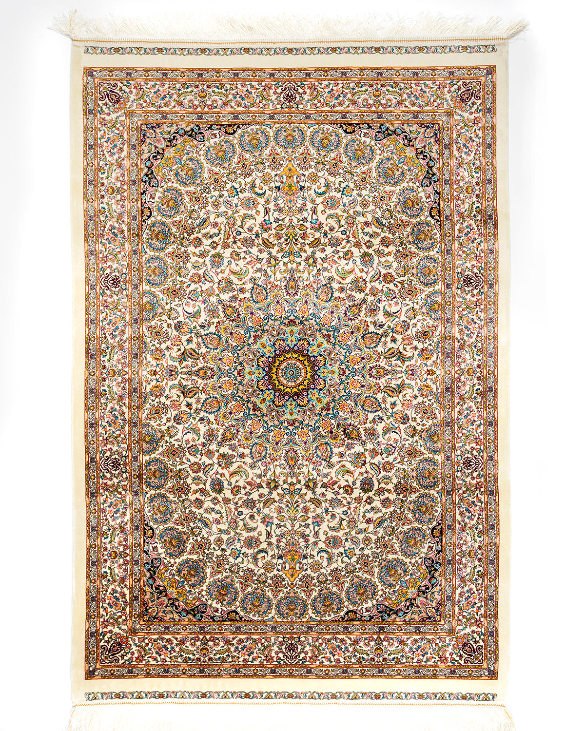 Yasmin ivory silk rug with a Persian floral medallion, full view