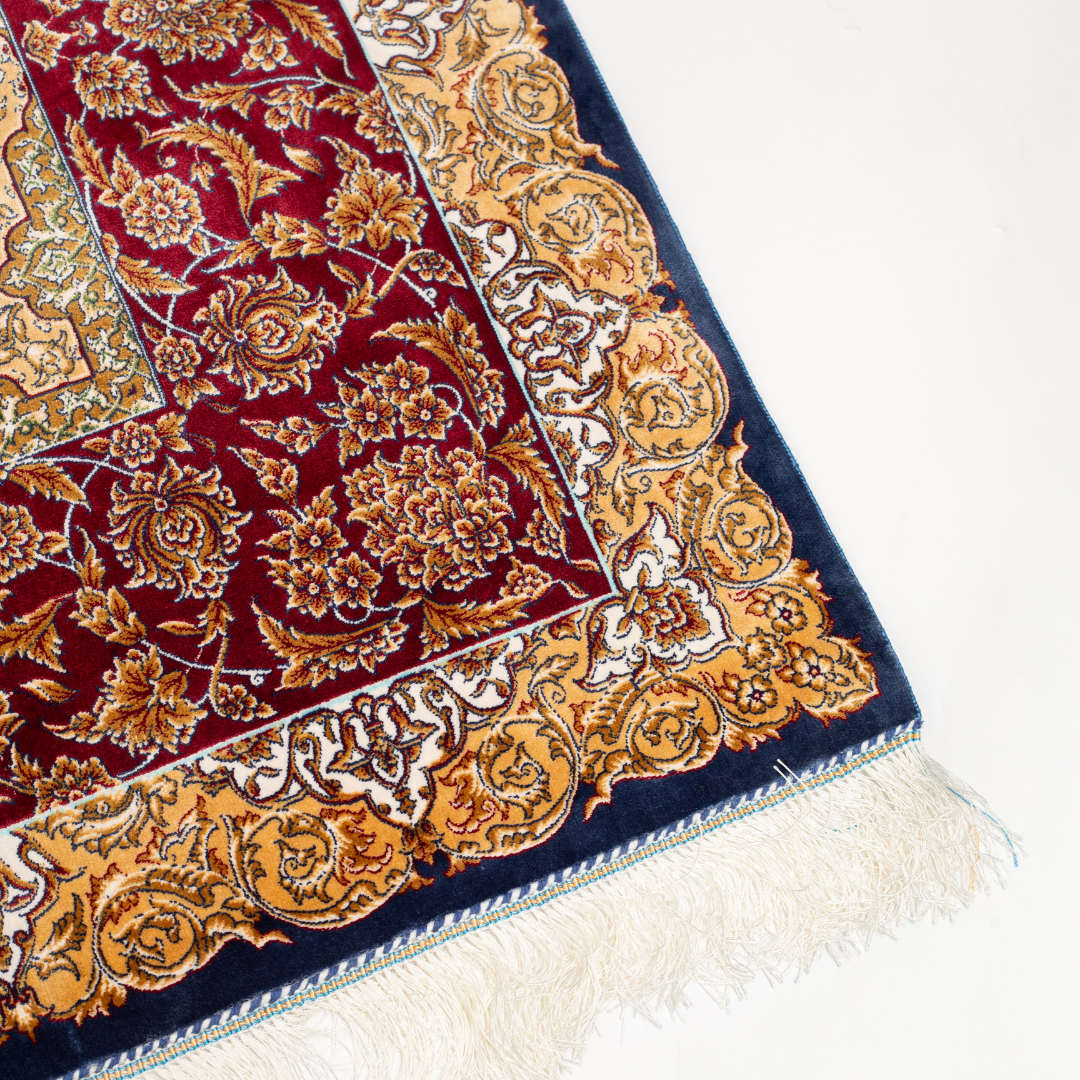 Zavira Silk Rug in 200x300 cm with crimson red base, ornate golden floral patterns, navy accents, and intricate woven detailing.