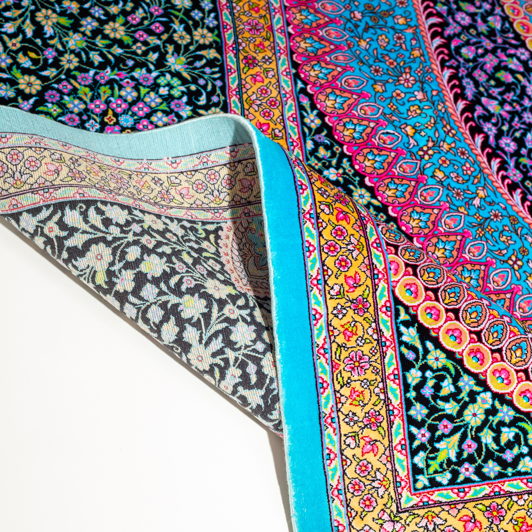 Luxurious silk rug in turquoise with intricate medallion and floral patterns, perfect for refined interiors.