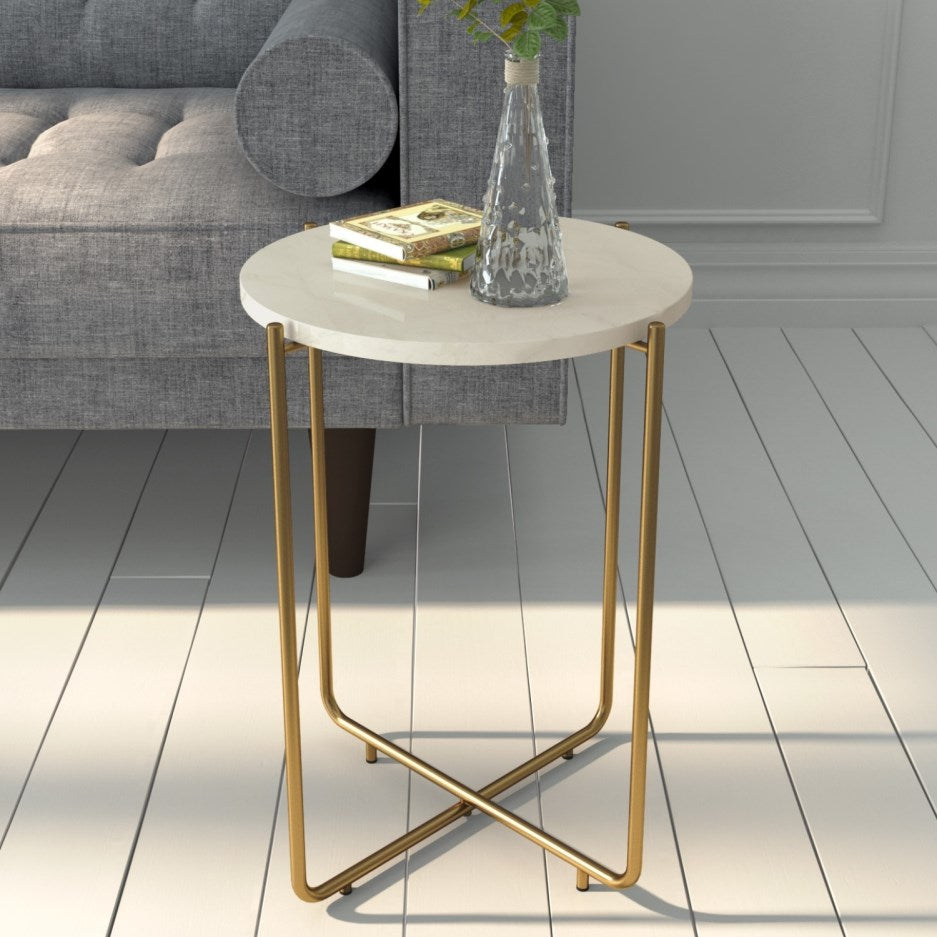 Marble side table featuring round white top with brass metal base, handcrafted furniture piece