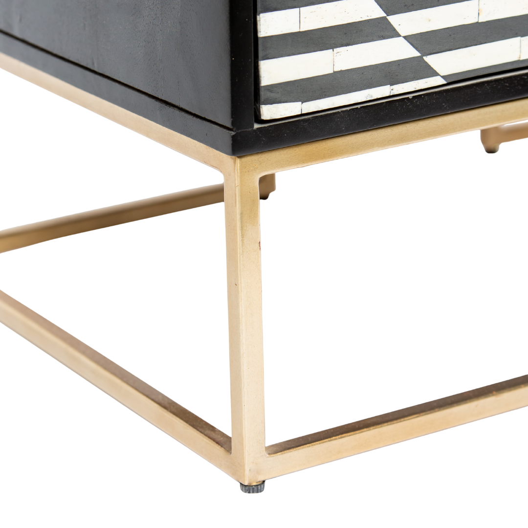 Black and white geometric bone inlay chest of drawers with gold base