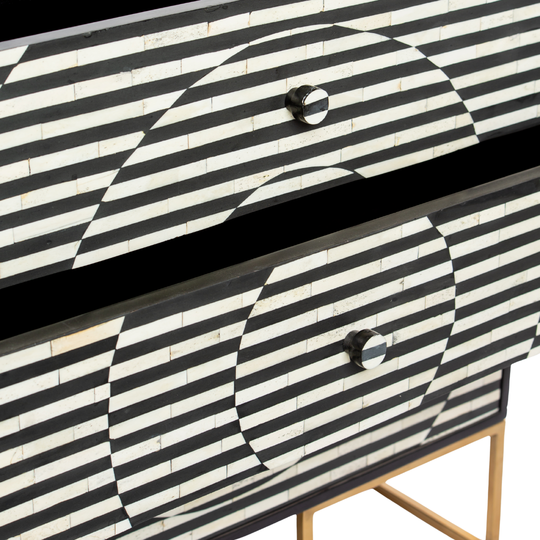 Black and white geometric bone inlay chest of drawers with gold base