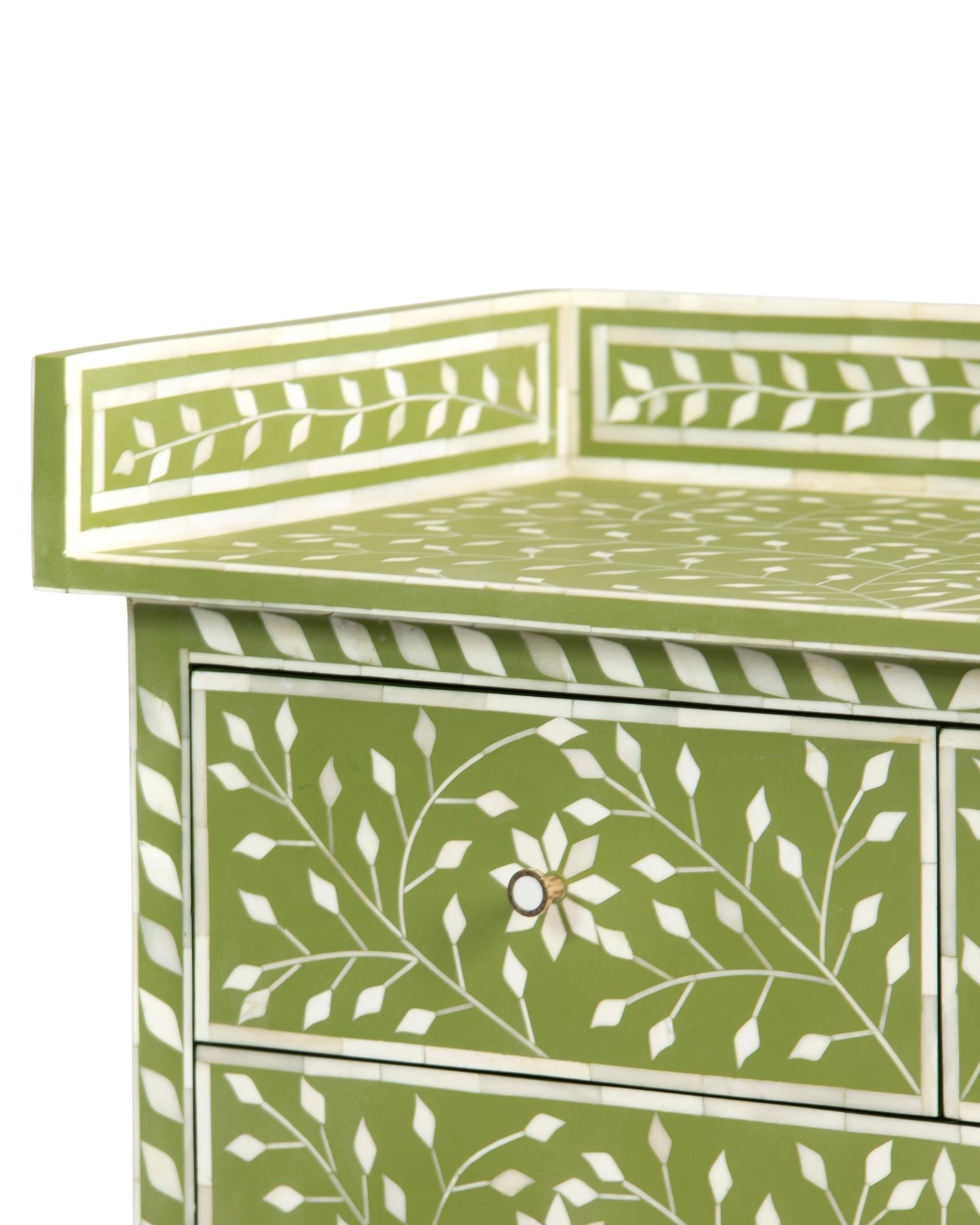 Bone inlay chest of drawers featuring intricate floral vine pattern in green and white, handcrafted furniture piece.
