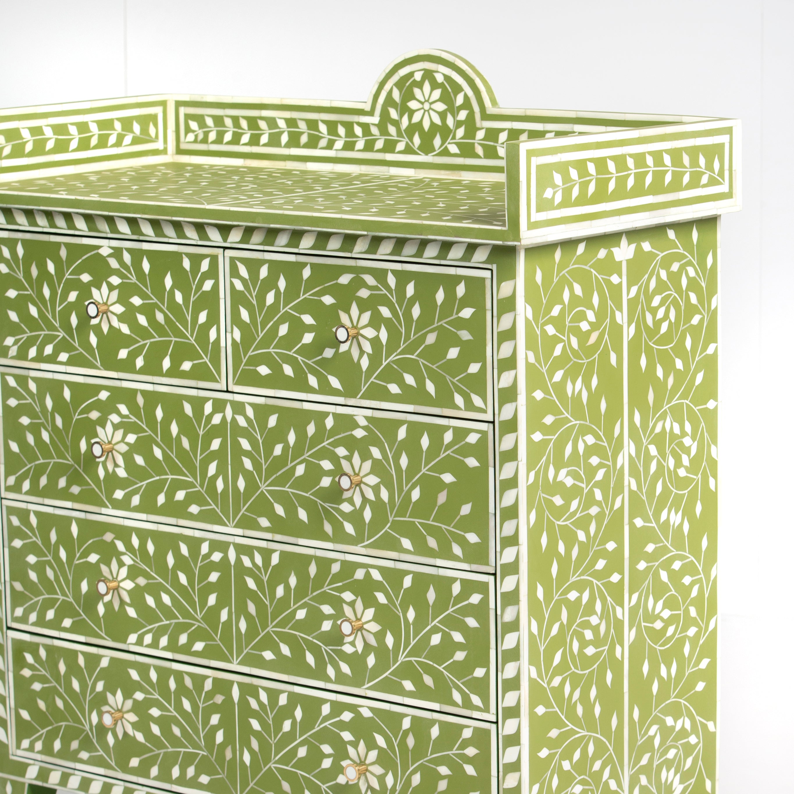 Bone inlay chest of drawers featuring intricate floral vine pattern in green and white, handcrafted furniture piece