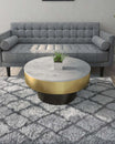 Avo Coffee Table with a luxurious white marble top, gold accent, and black cylindrical base. A modern statement piece for living spaces.
