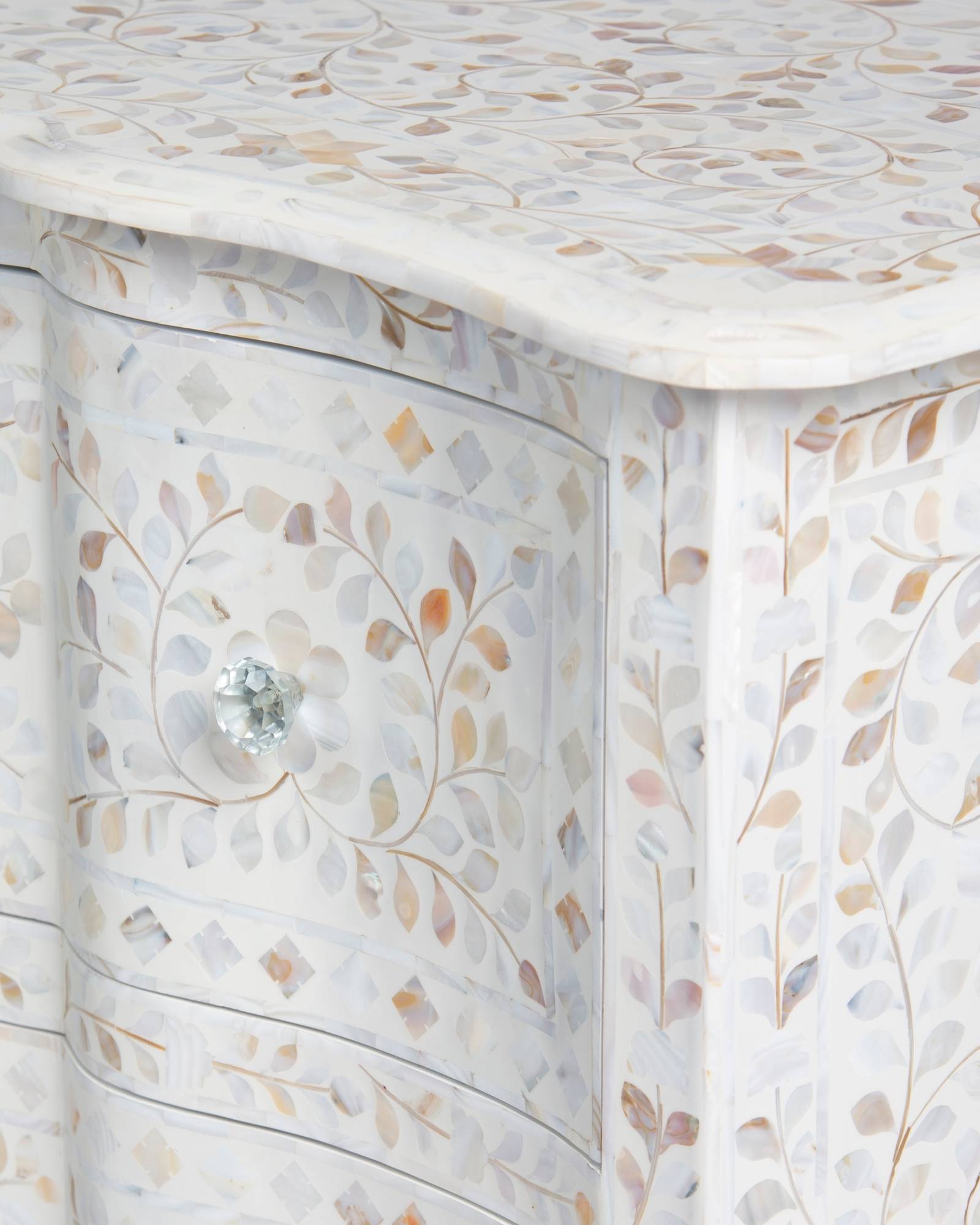 Mother of pearl inlay chest of drawers featuring intricate floral pattern in white and multitone, handcrafted furniture piece