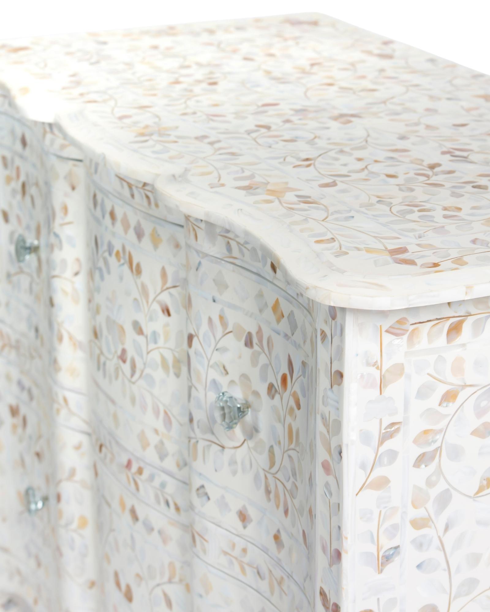Mother of pearl inlay chest of drawers featuring intricate floral pattern in white and multitone, handcrafted furniture piece