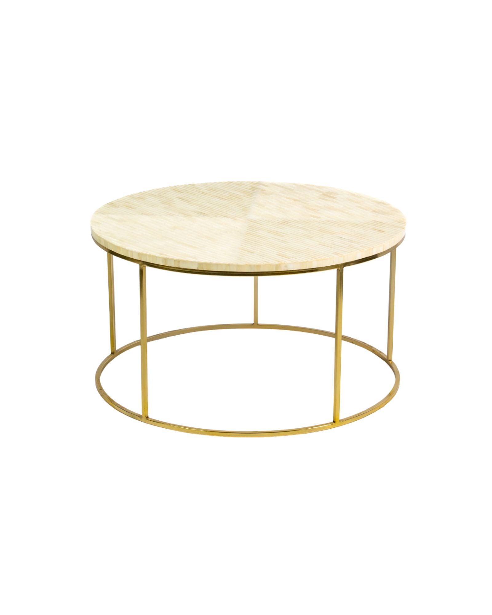 Ivory bone carved coffee table with linear textured pattern and gold metal circular frame by Tabeer Homes.