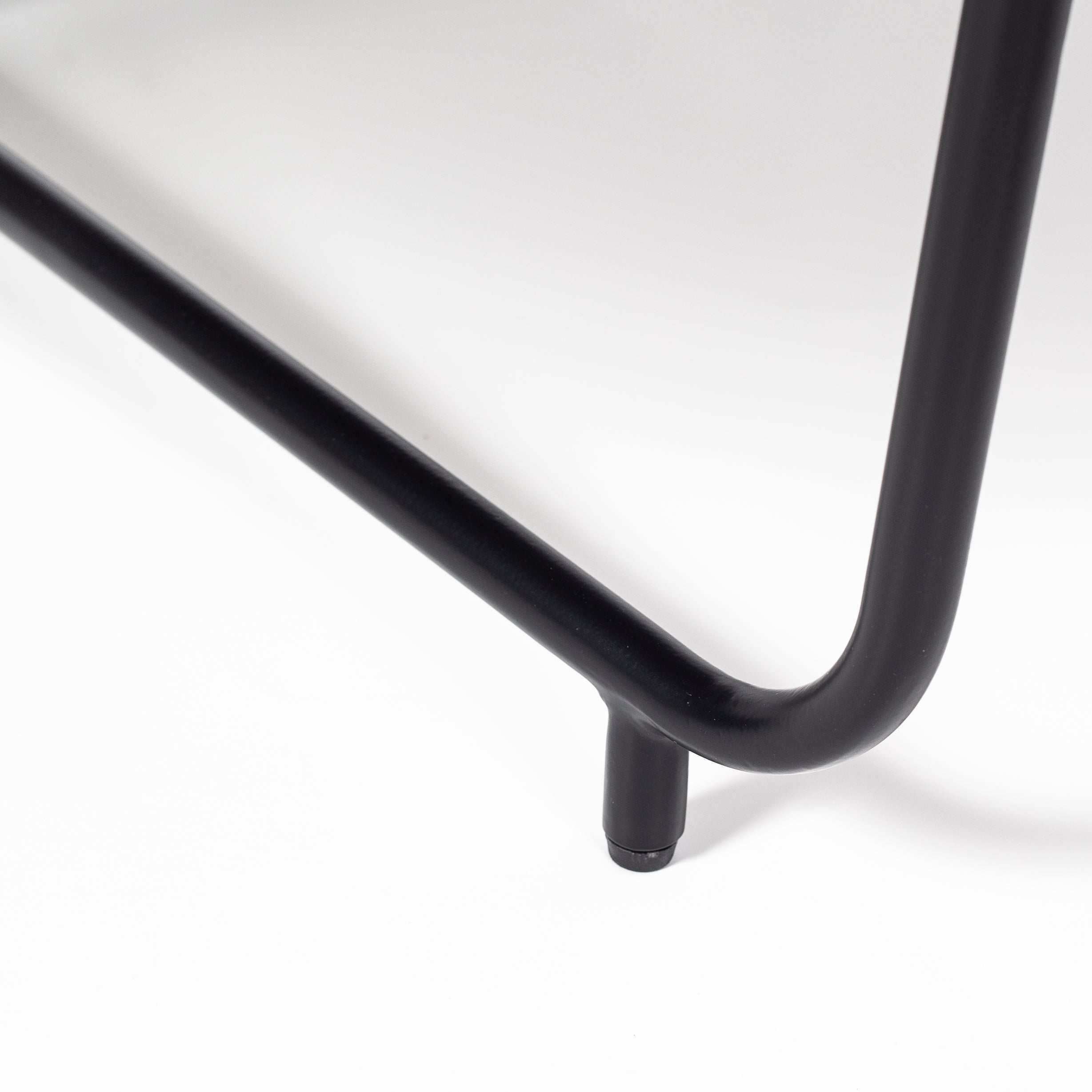 Round coffee table with genuine agate stone top and sleek black metal base, modern and luxurious centerpiece design.